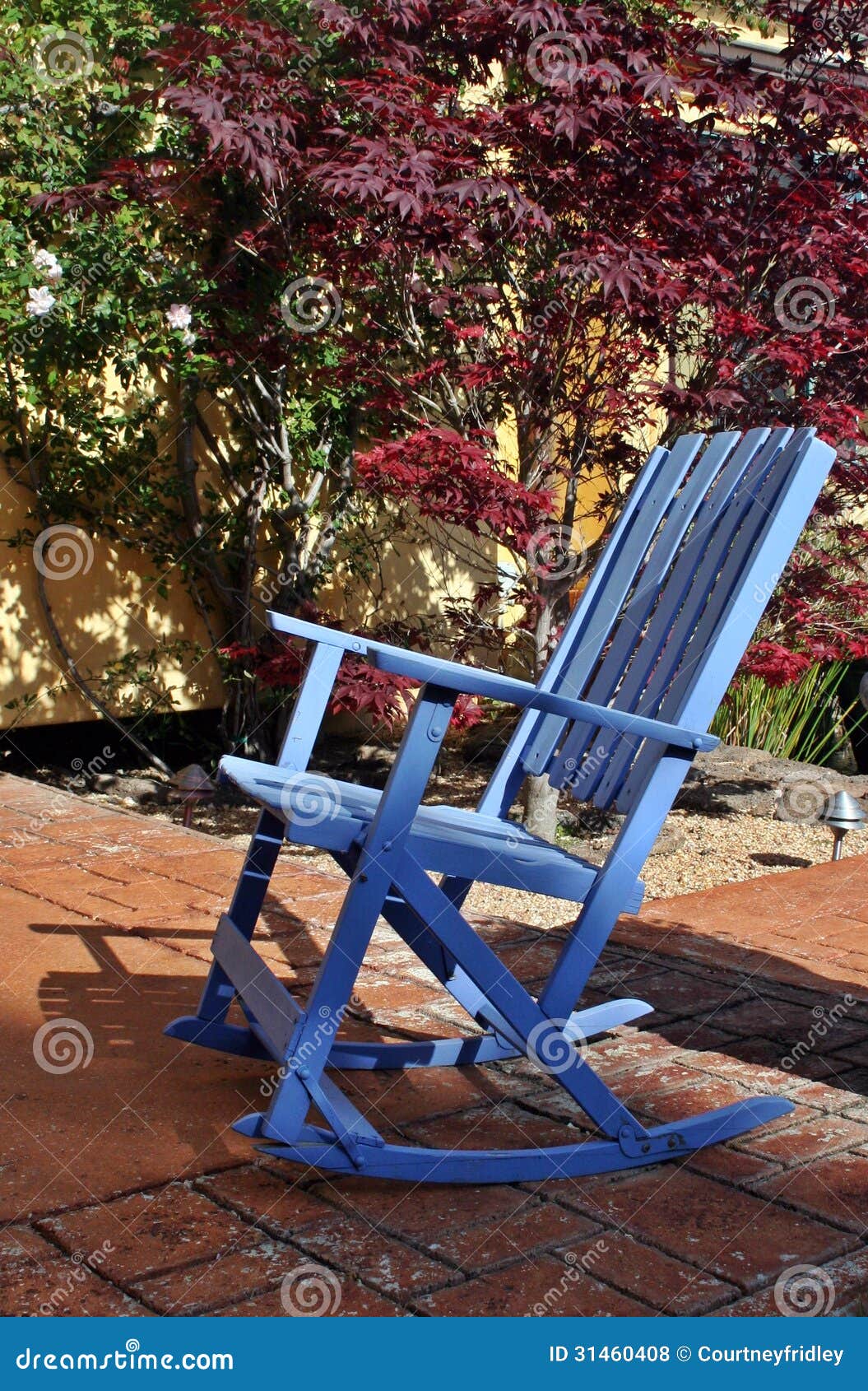 Blue Rocking Chair On A Stone Patio Royalty Free Stock Photos - Image ...