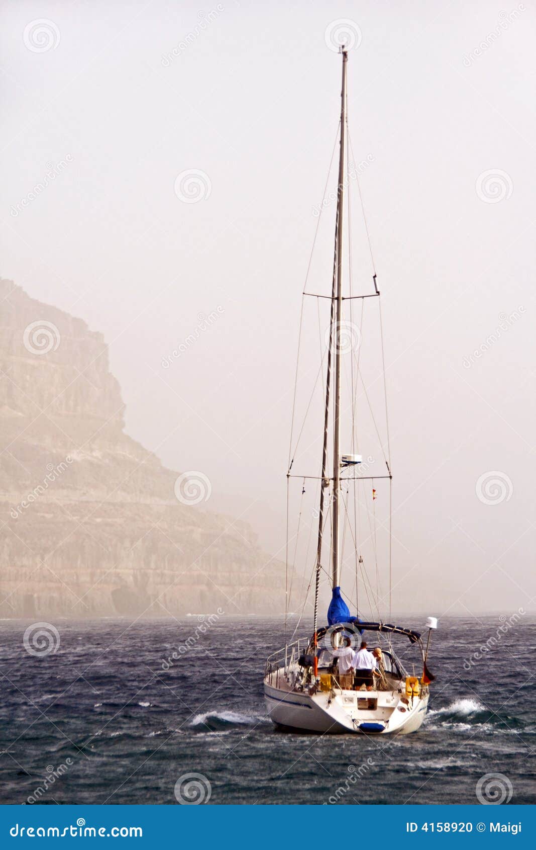 Yacht in choppy waters off coast of Gran Canaria.