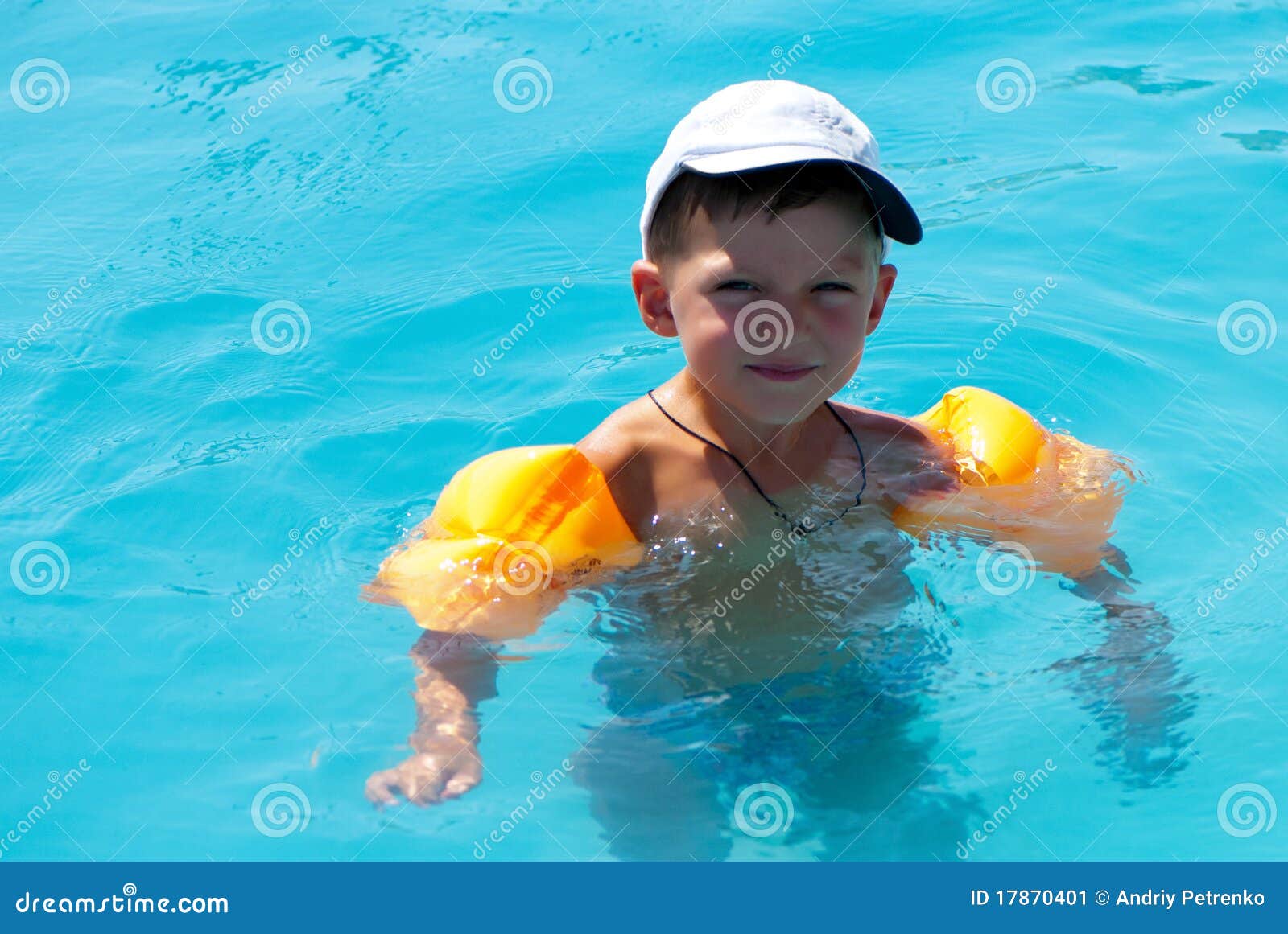 The Boy Floats In Pool Stock Image - Image: 17870401