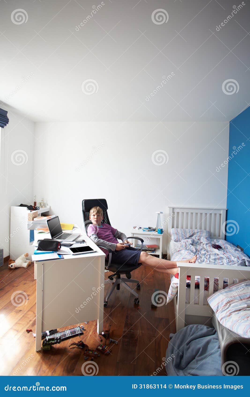 Boy Playing Video Game In Bedroom Stock Images - Image: 31863114