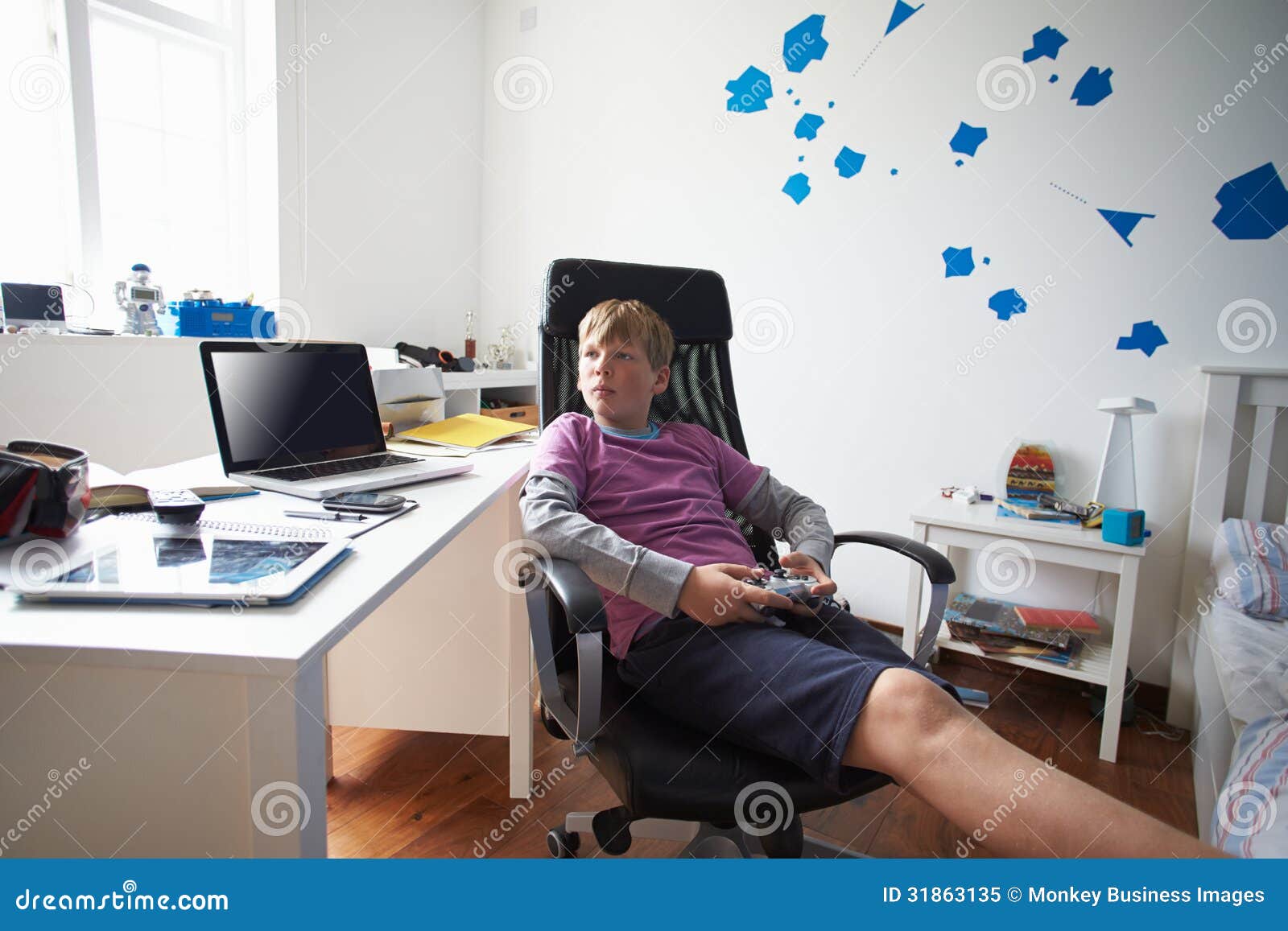 Boy Playing Video Game In Bedroom Royalty Free Stock Photo - Image ...