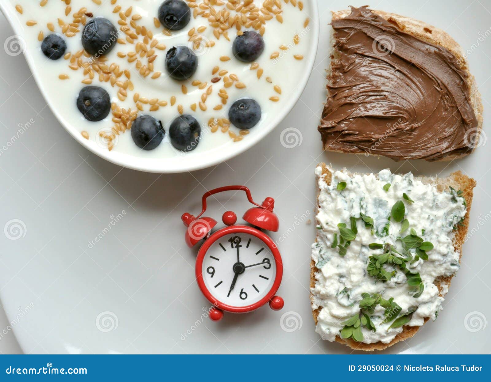 Breakfast With Yogurt, Cheese And Chocolate On White Table Stock Images