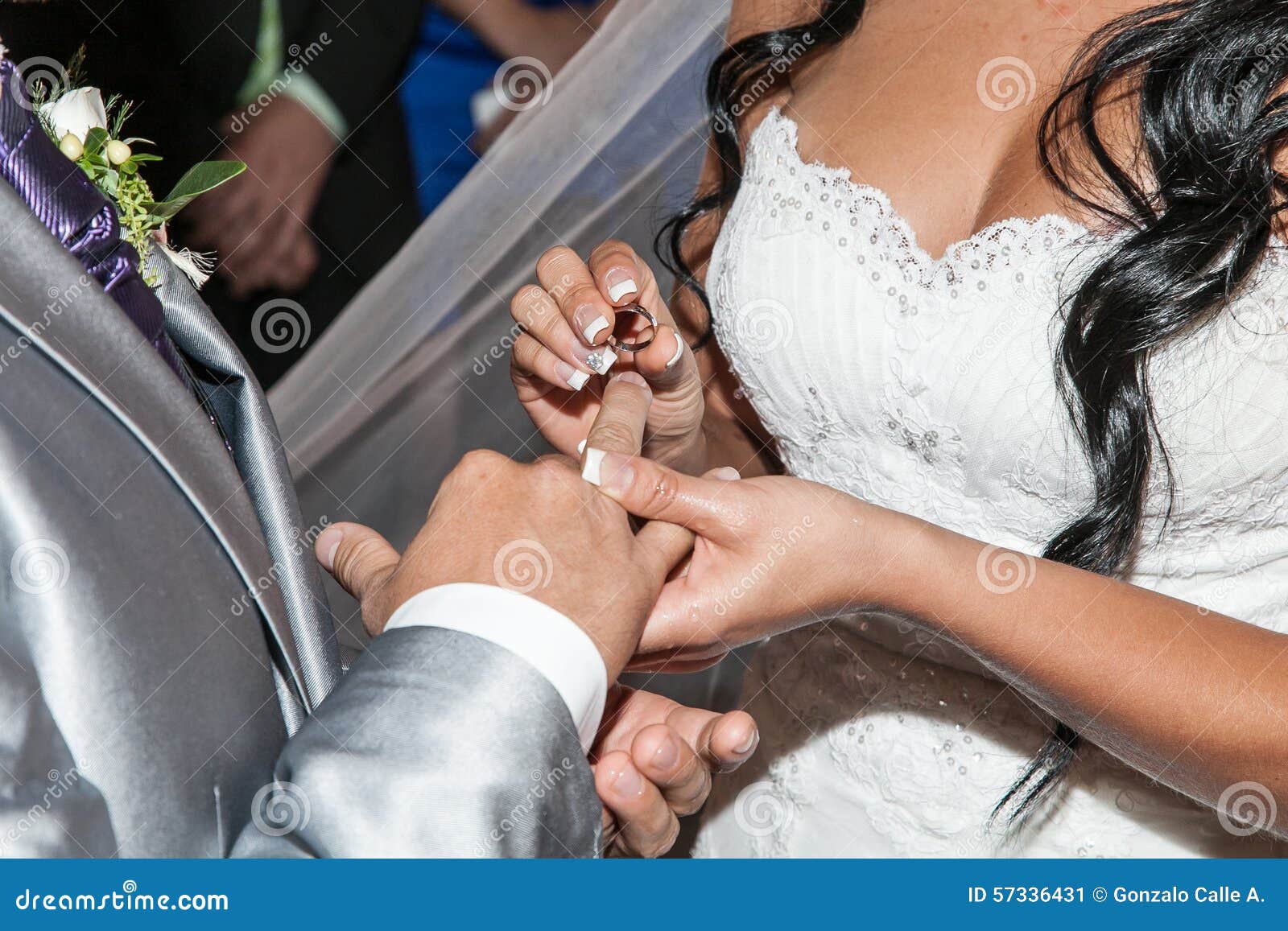 Groom wedding ring finger