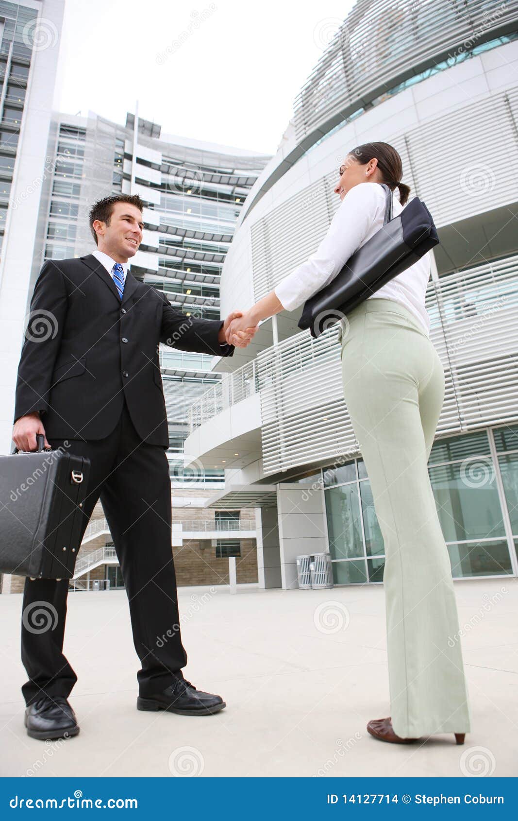 A Business Man Team Handshake At Office Building A Business Man Team Handshake At Office Building
