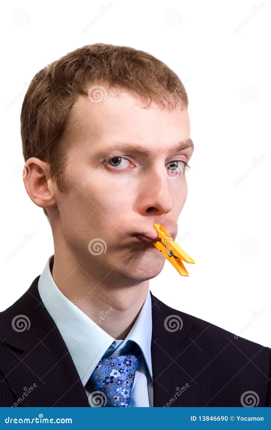 businessman-clothespin-his-mouth-1384669