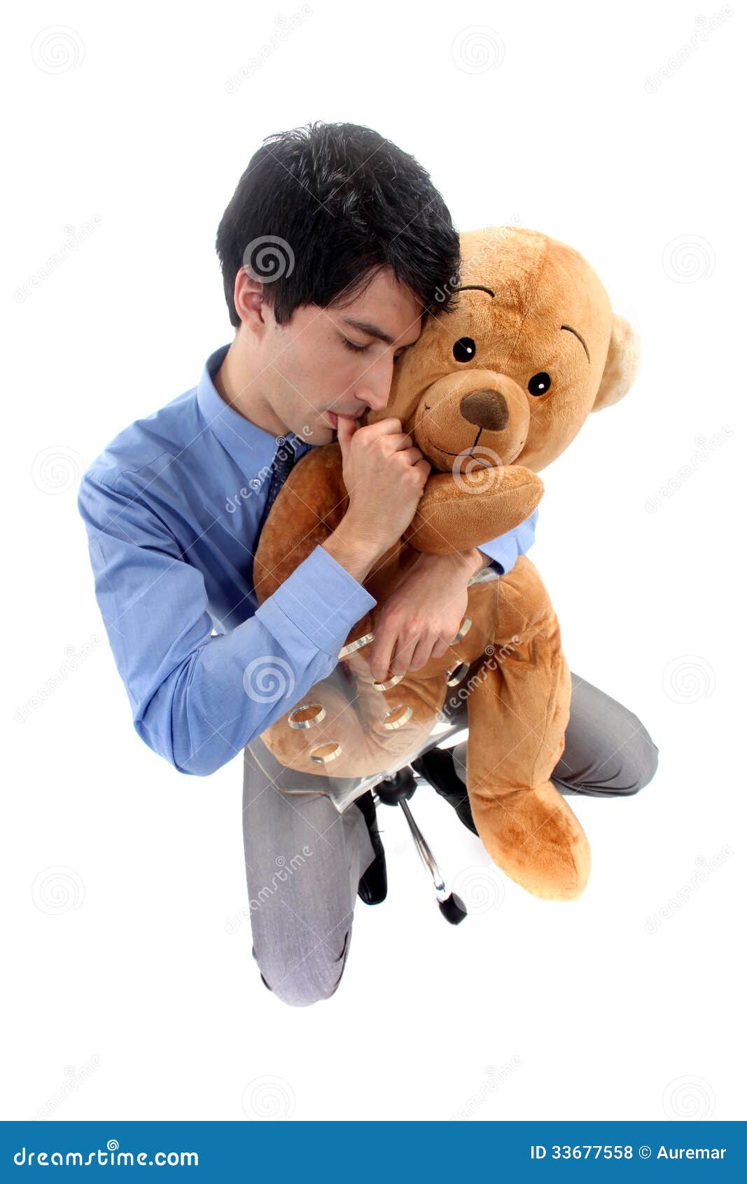 businessman-hugging-teddy-bear-33677558.