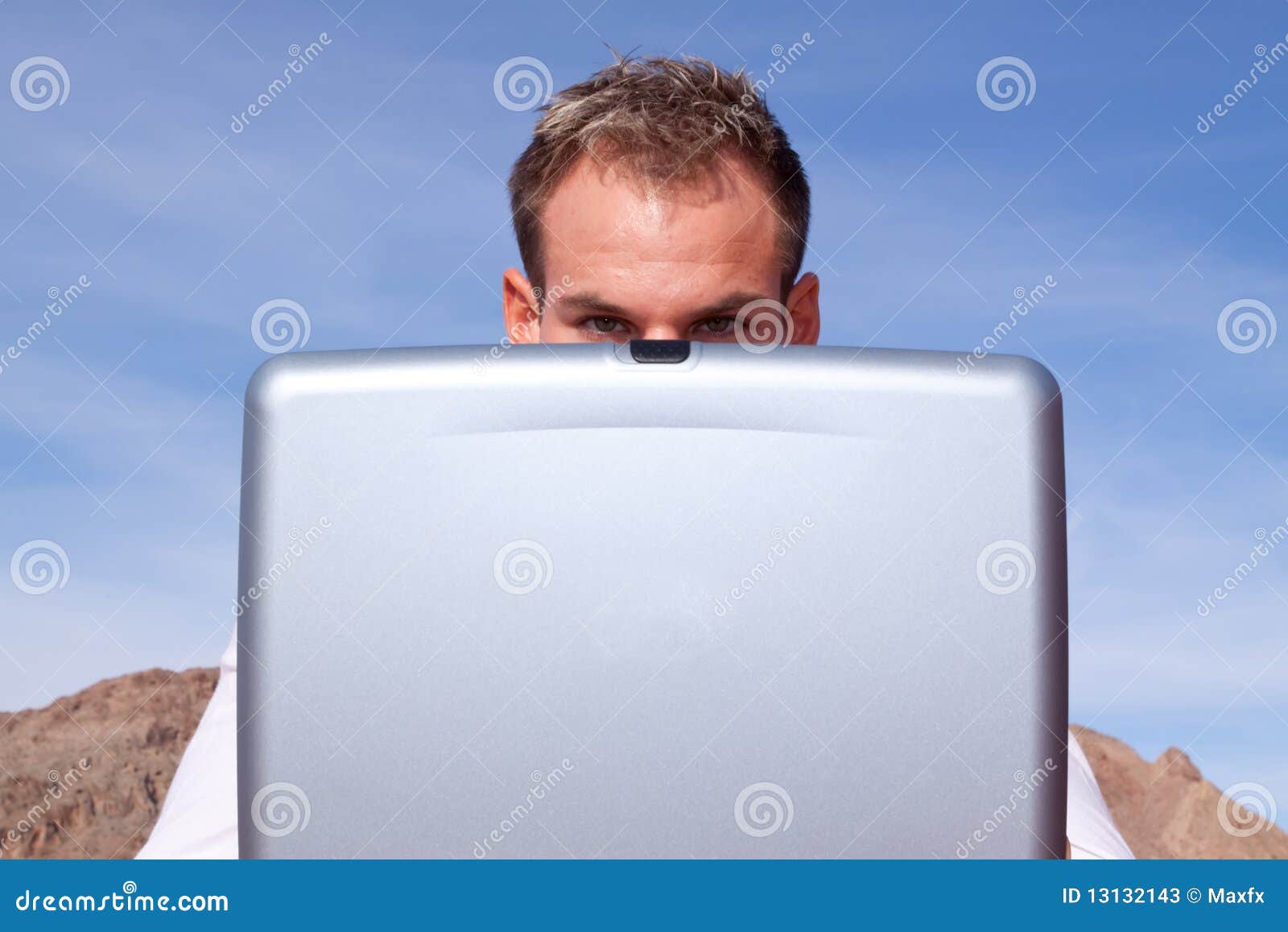 [Image: businessman-peeking-over-laptop-13132143.jpg]