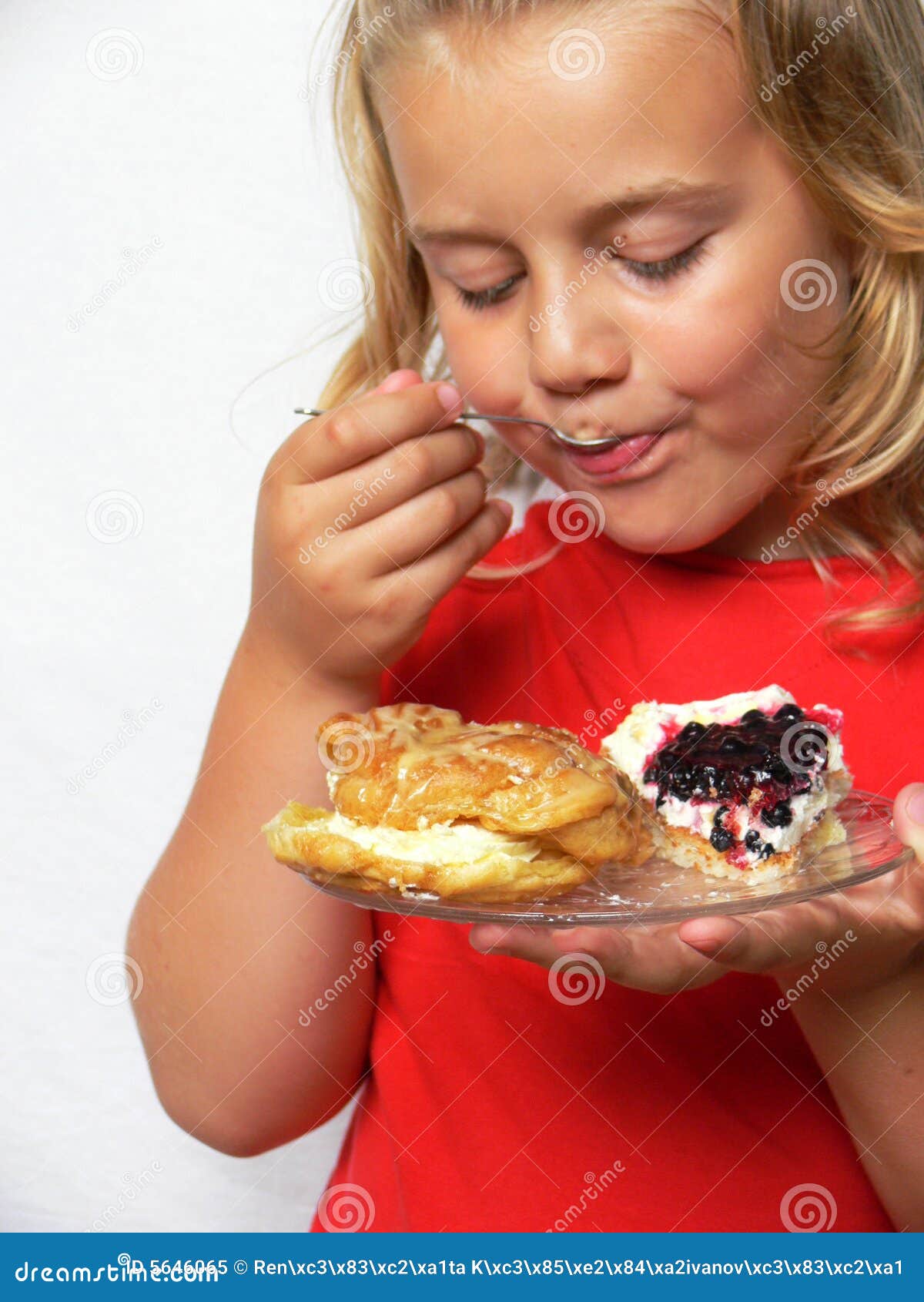 Child Is Eating Sweets Royalty Free Stock Photo - Image: 5646065