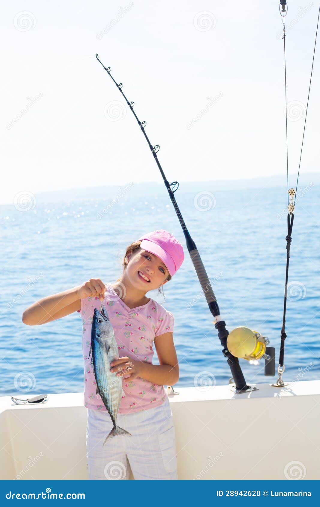 Child Little Girl Fishing In Boat Holding Little Tunny Fish Catc Stock 