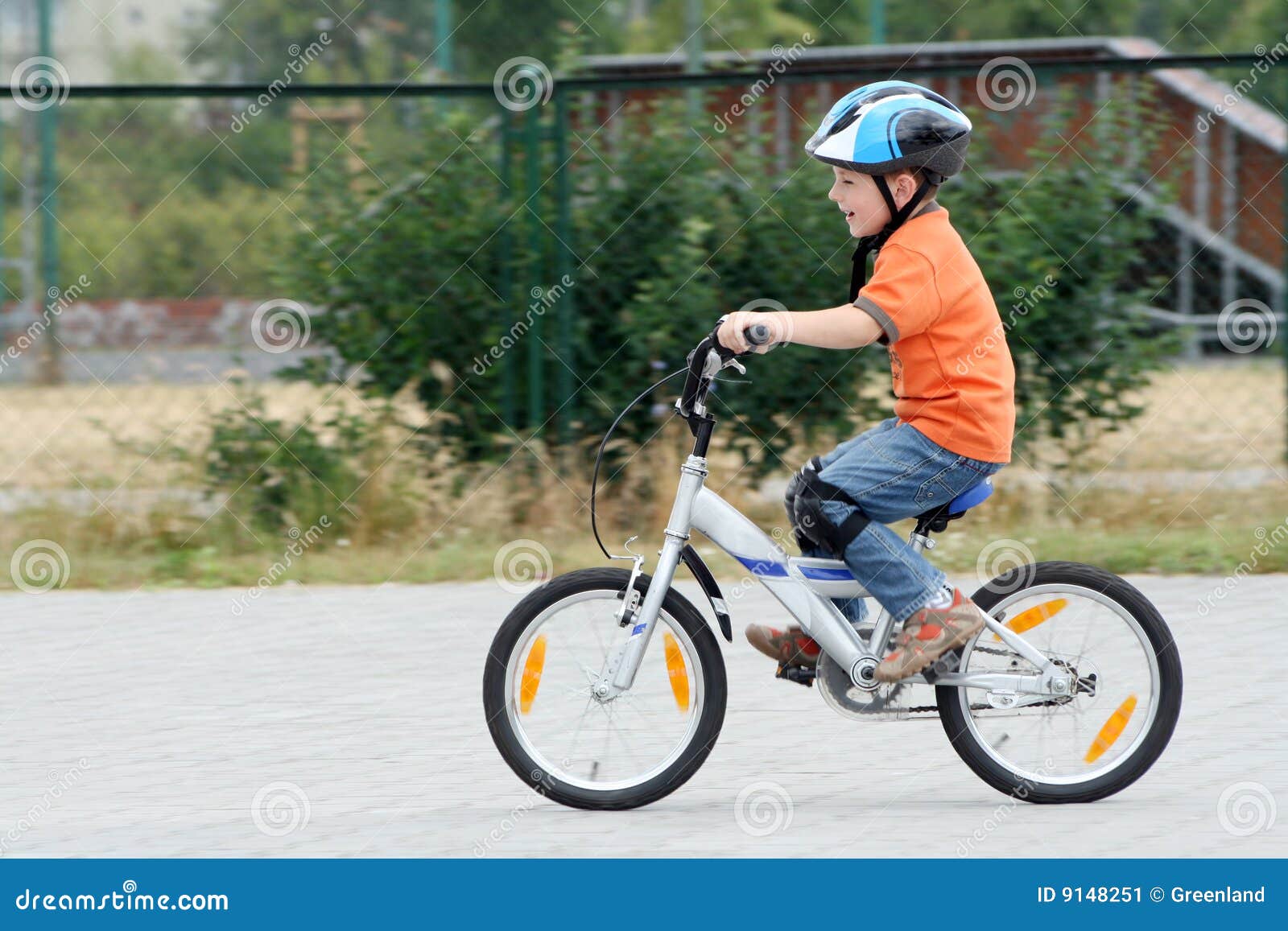 Child Riding A Bicycle