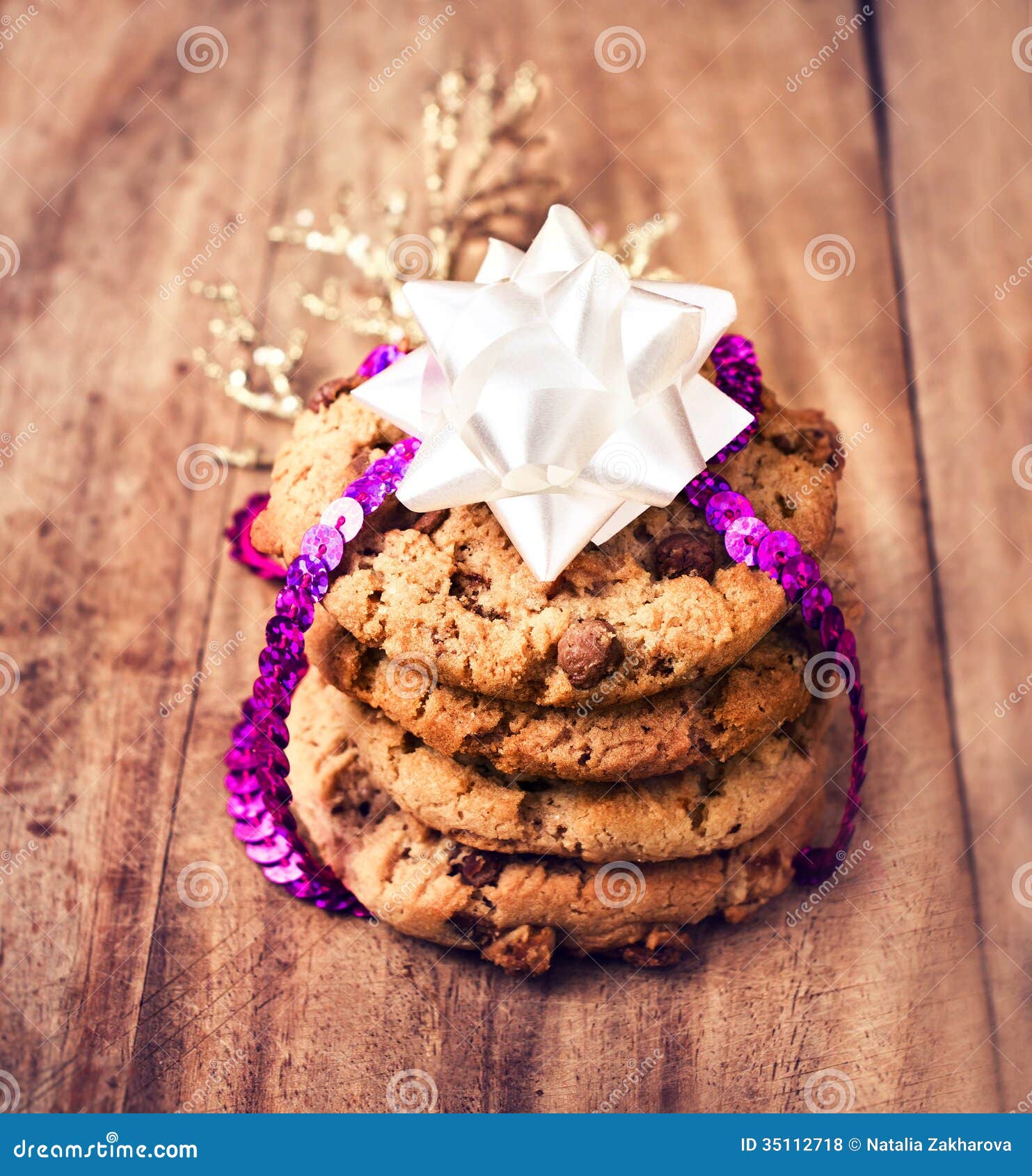  wooden table. Festive Chocolate chip cookies on rustic background