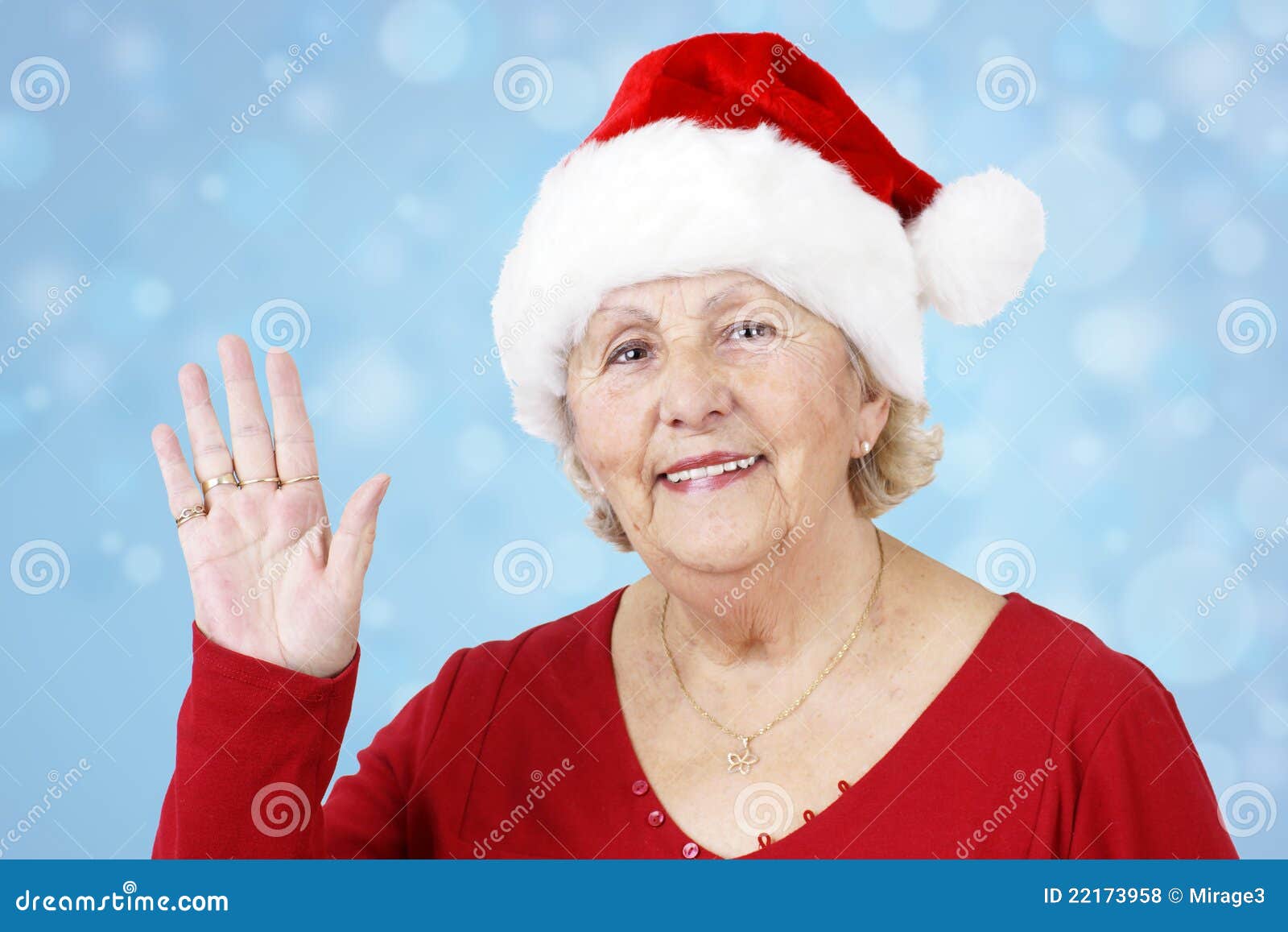 christmas-hat-grandma-waving-over-blue-2