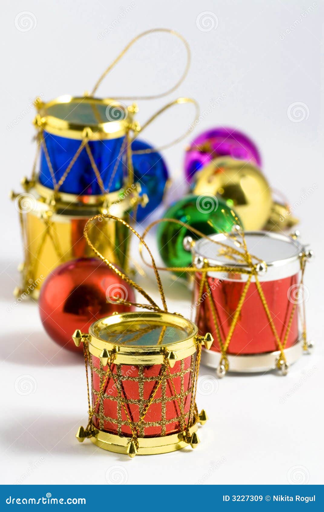 Several colorful christmas tree decorations of different types.