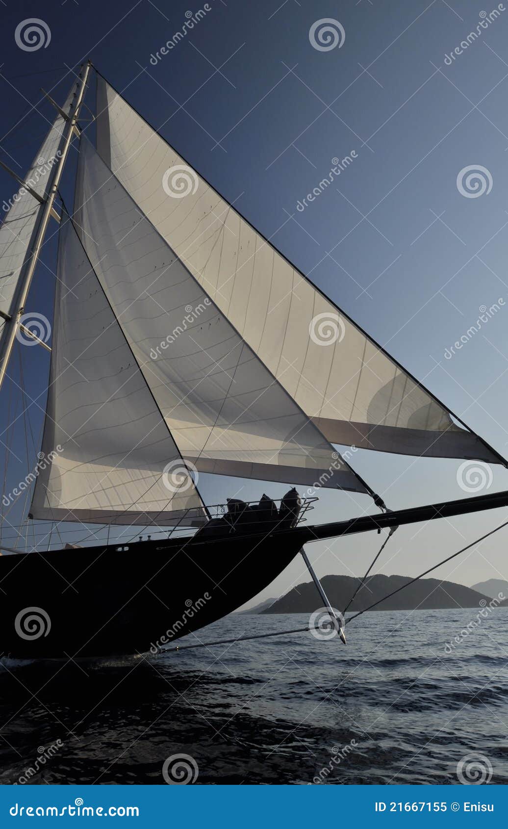 Classic black black sailboat sailing at the Mediterranean sea.