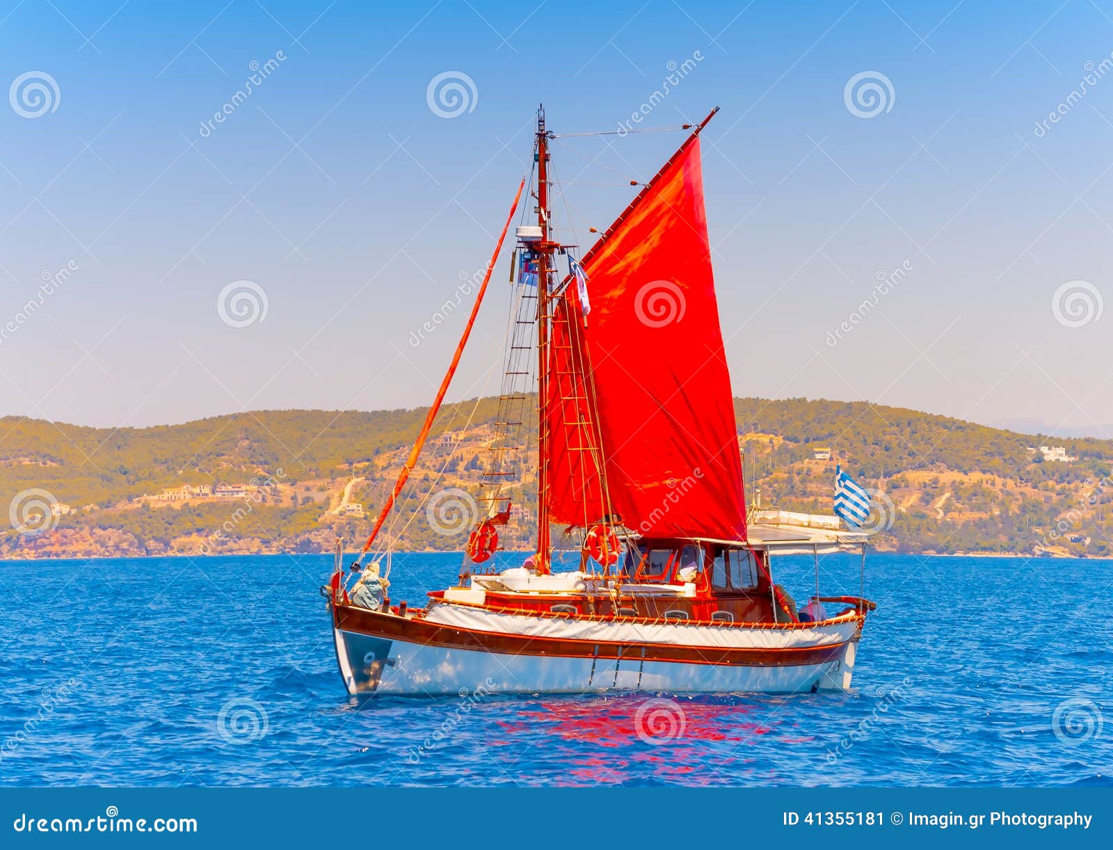 old classic wooden greek boat kaiki with sails during a classic boats 