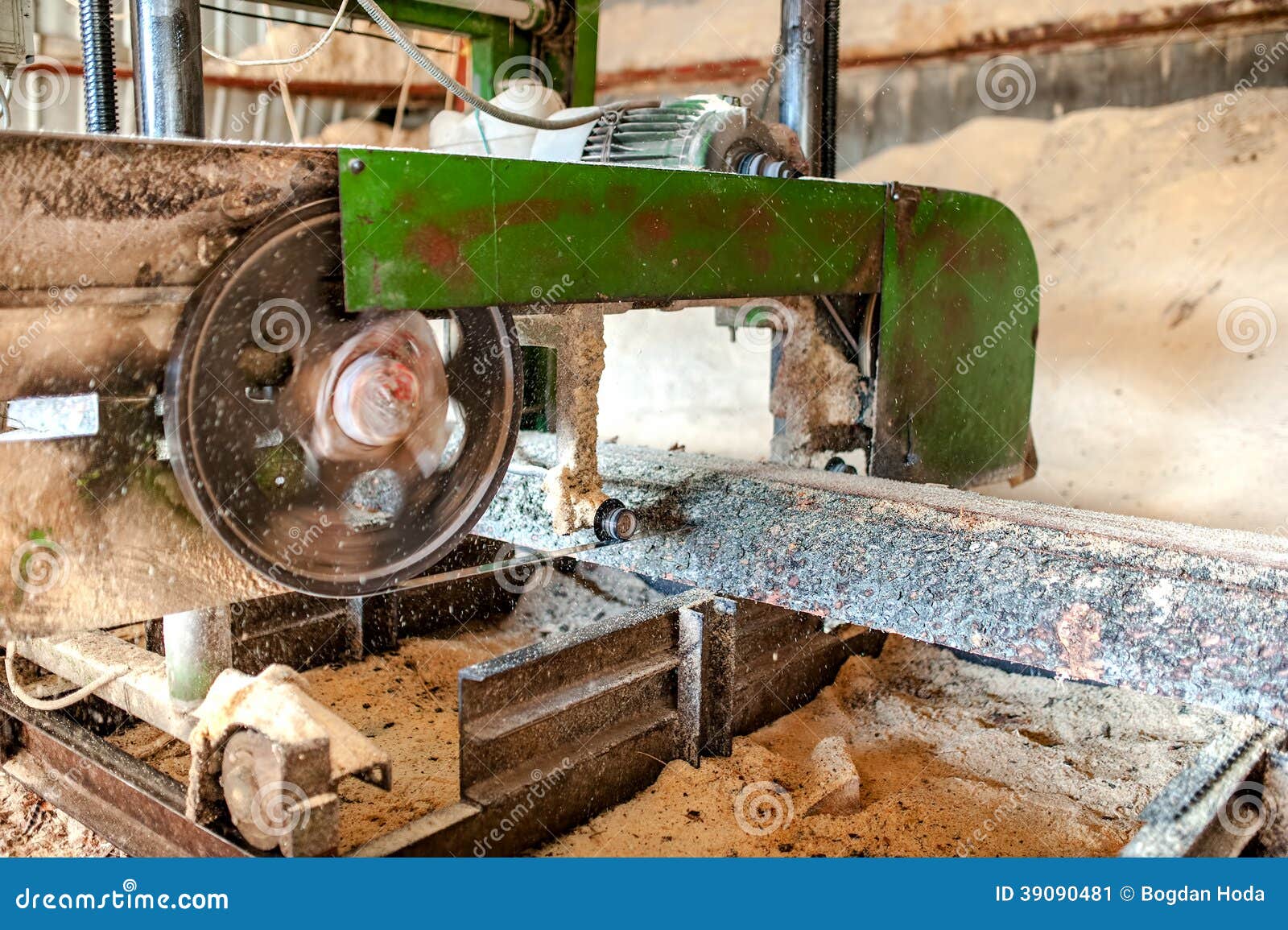  wood production factory - close-up of band saw sawmill cutting wood