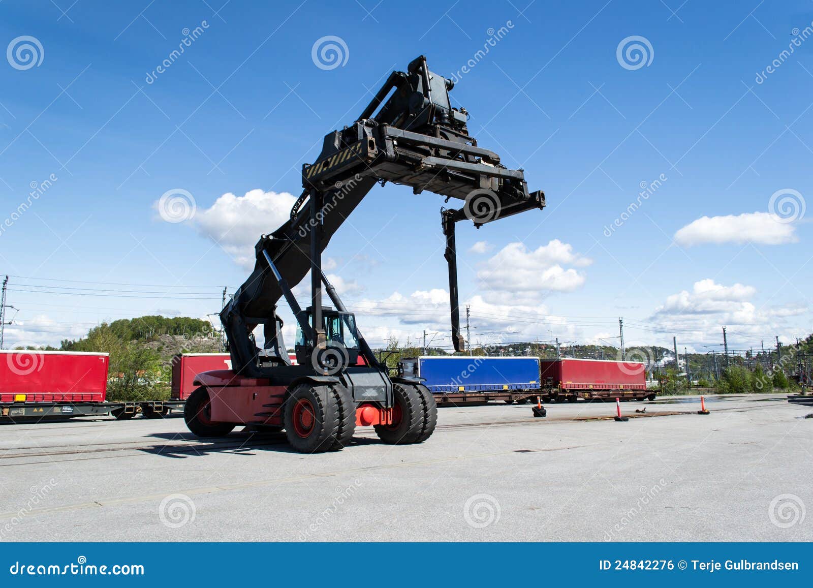 This is a large container truck at work in the dock in Halden, Norway 