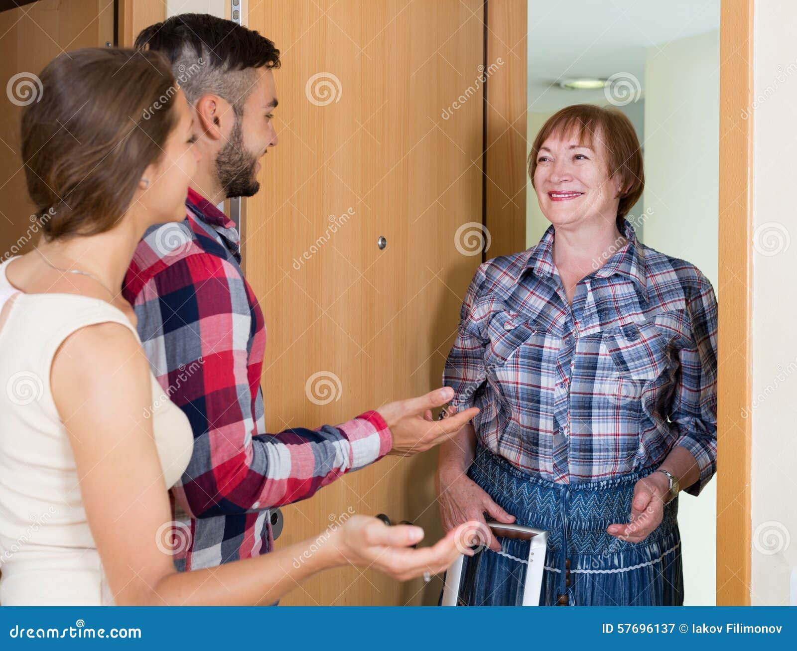 Couple Came To Visit Mother At The Parental Home Stock