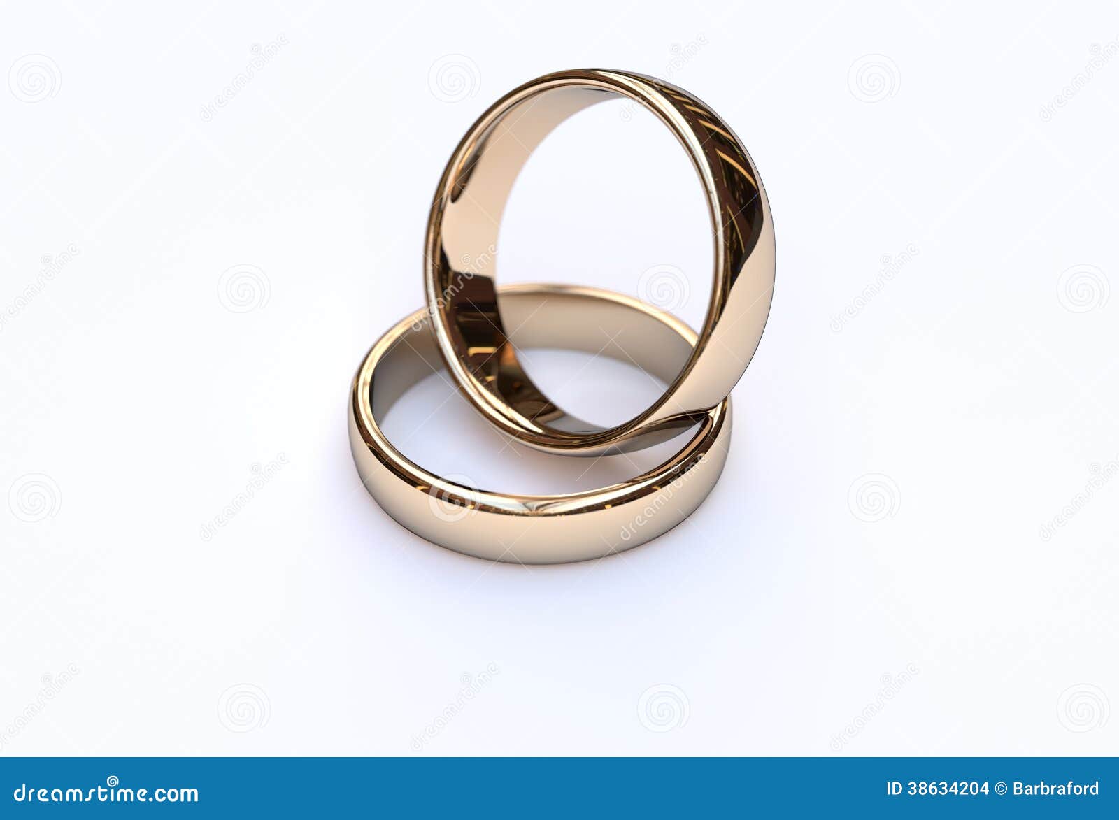 Golden wedding rings on white background, close up.