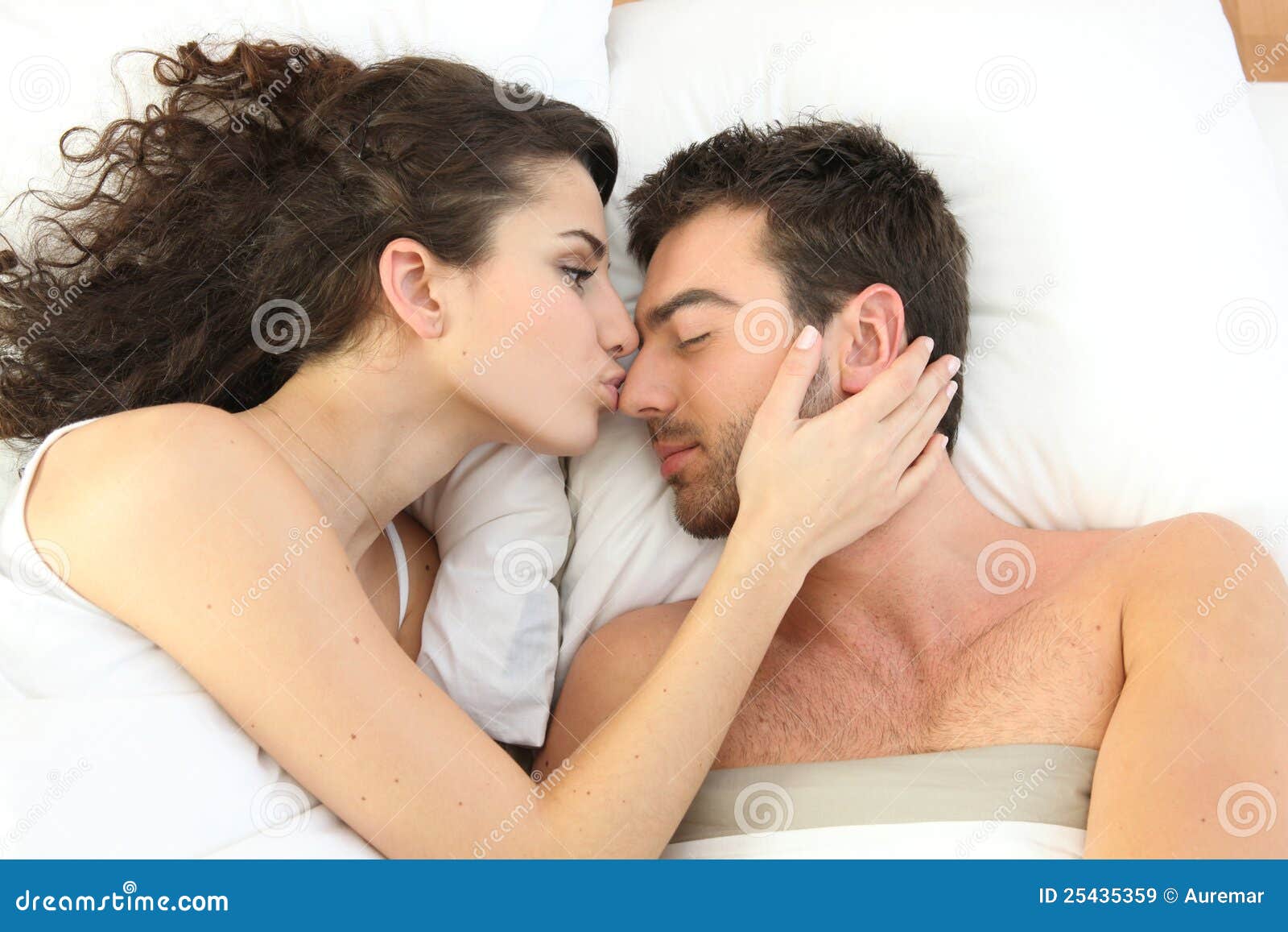 Couple Kissing In Bed Royalty Free Stock Images - Image: 25435359