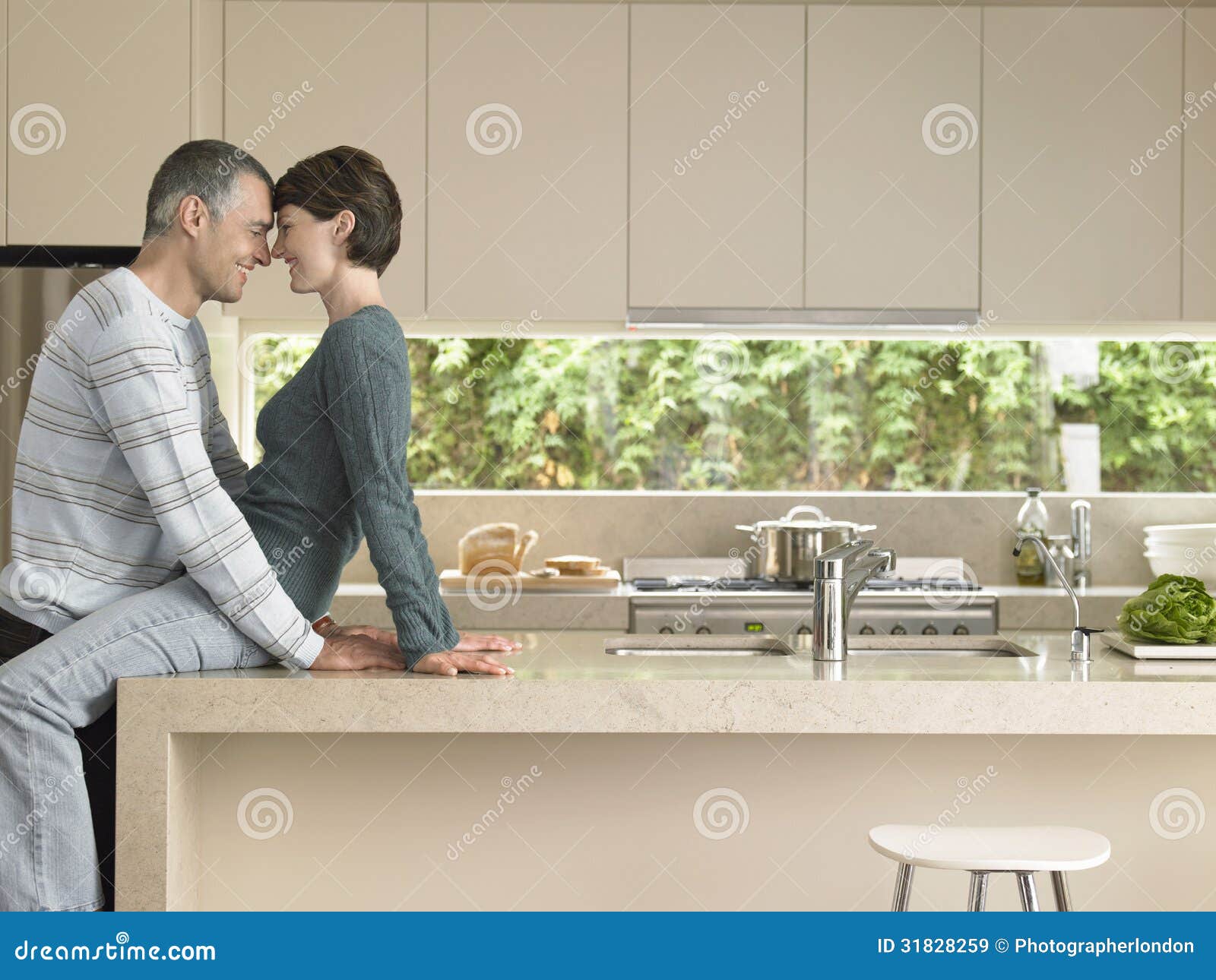 Couple Rubbing Noses In Kitchen Royalty Free Stock Images Image 31828259