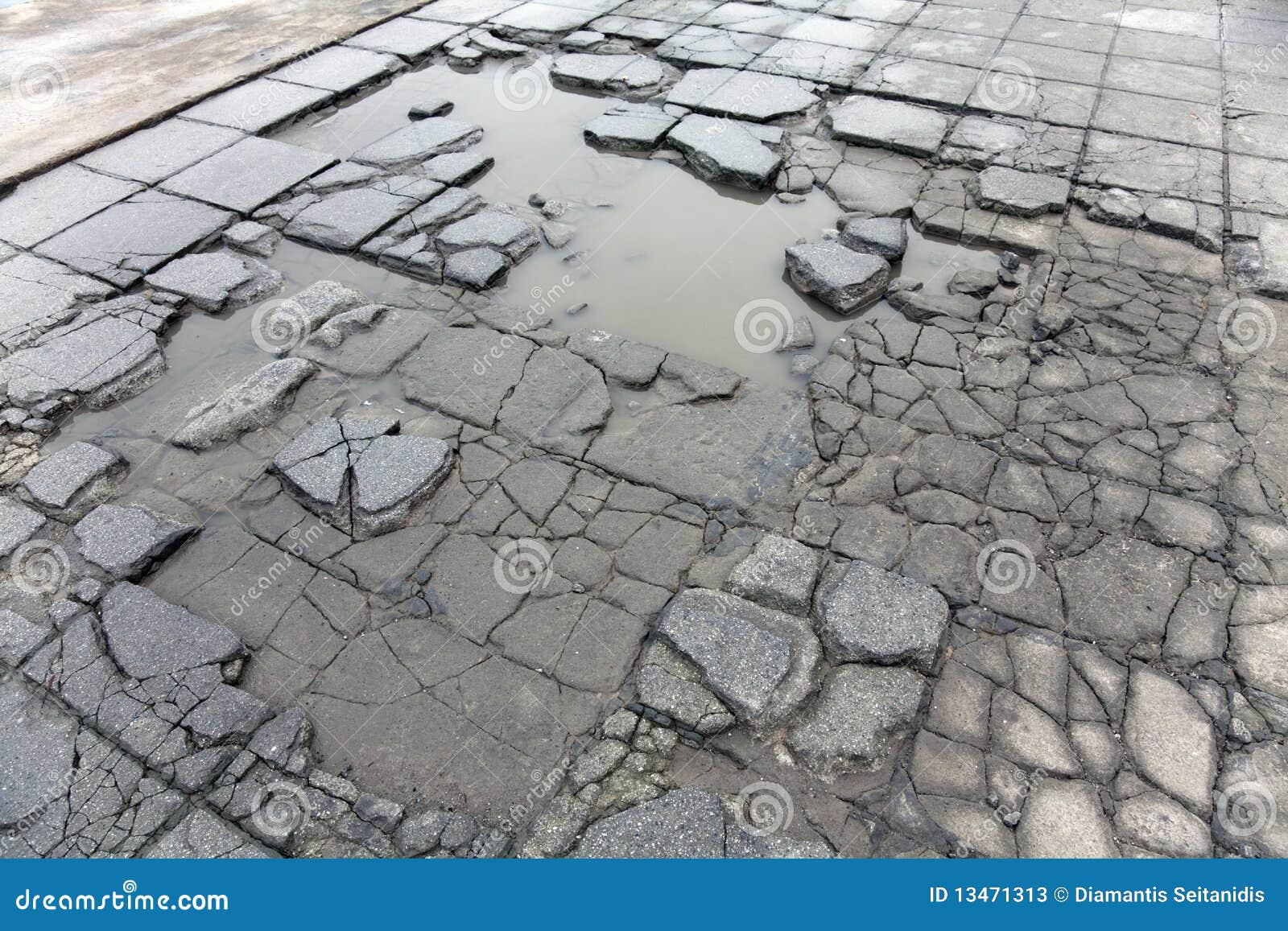 cracked-pavement-slabs-13471313.jpg