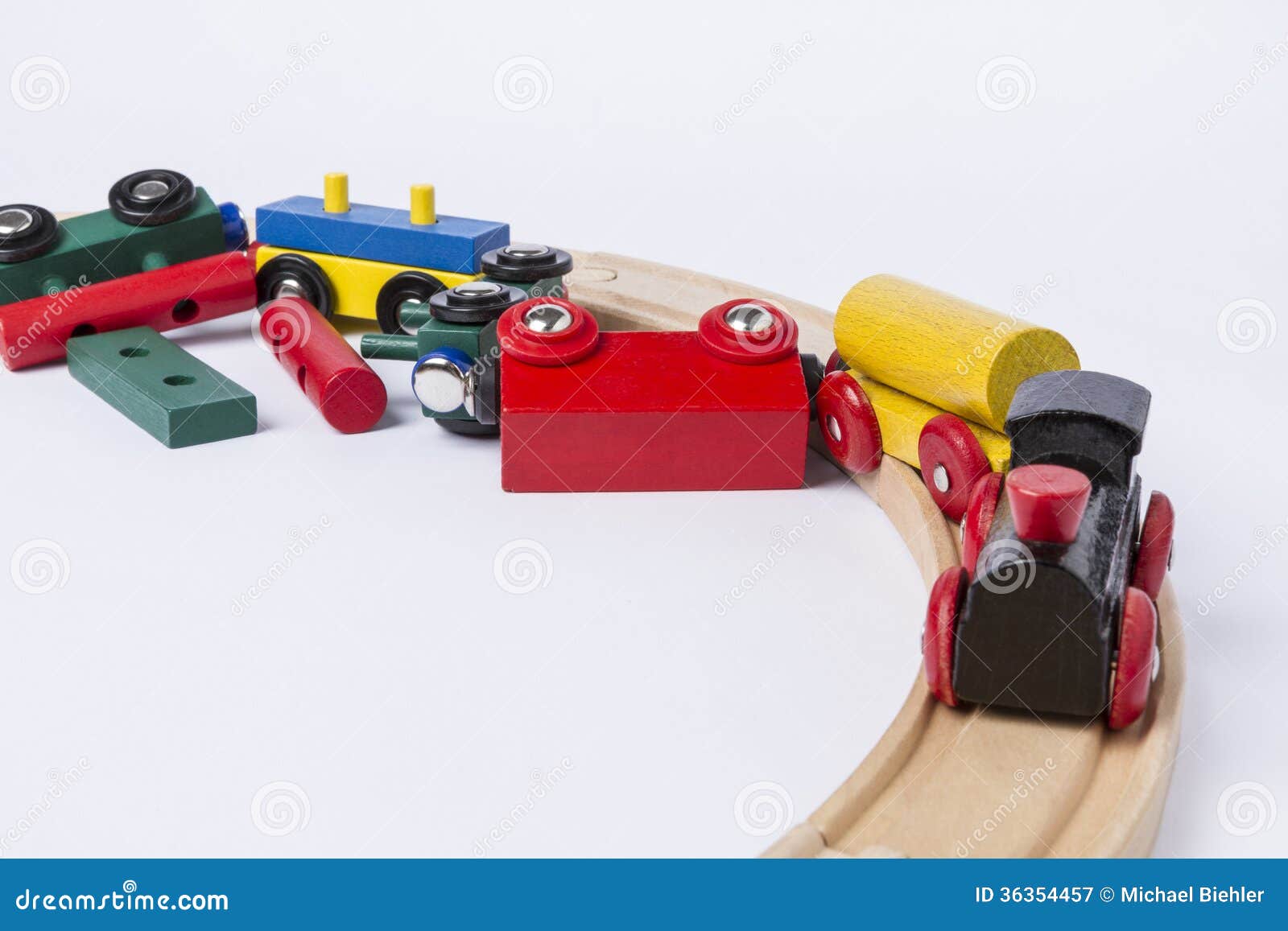 Derail wooden toy train in top view. horizontal image.