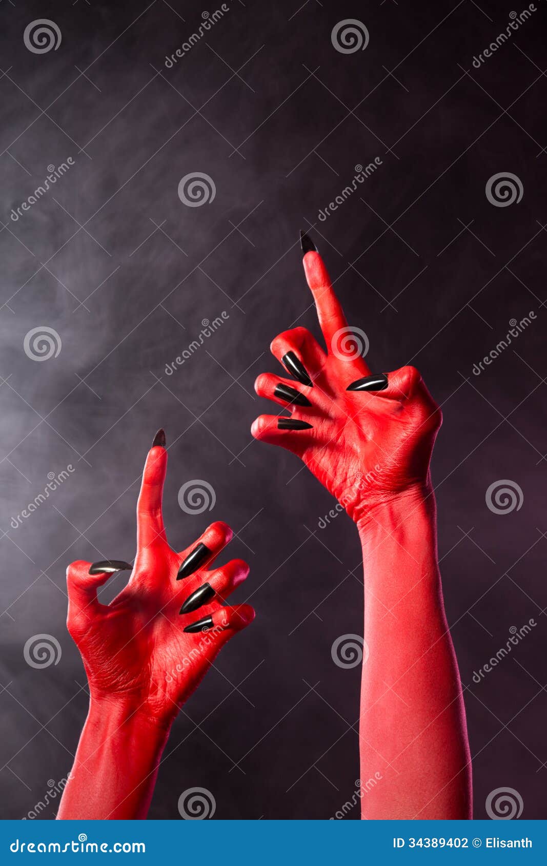 Creepy Red Devil Hands With Black Nails Stock Photography ...