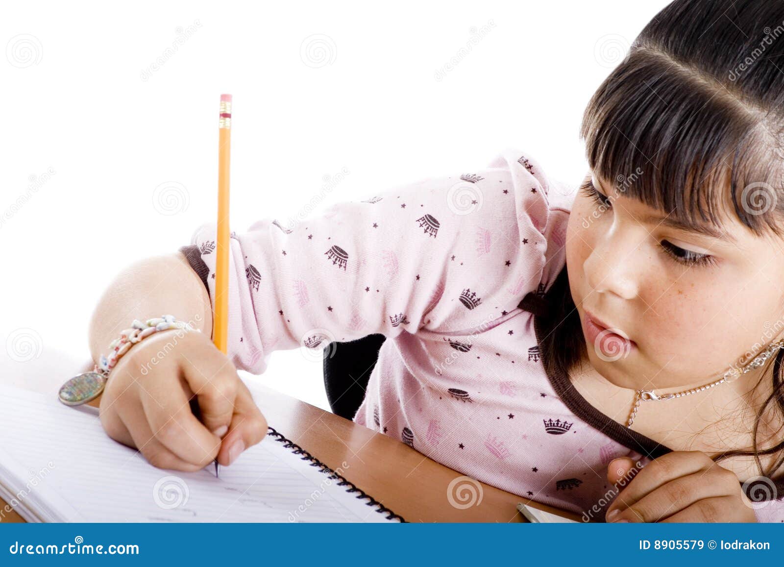 Little Girl Doing Homework By The Computer Stock Photo 