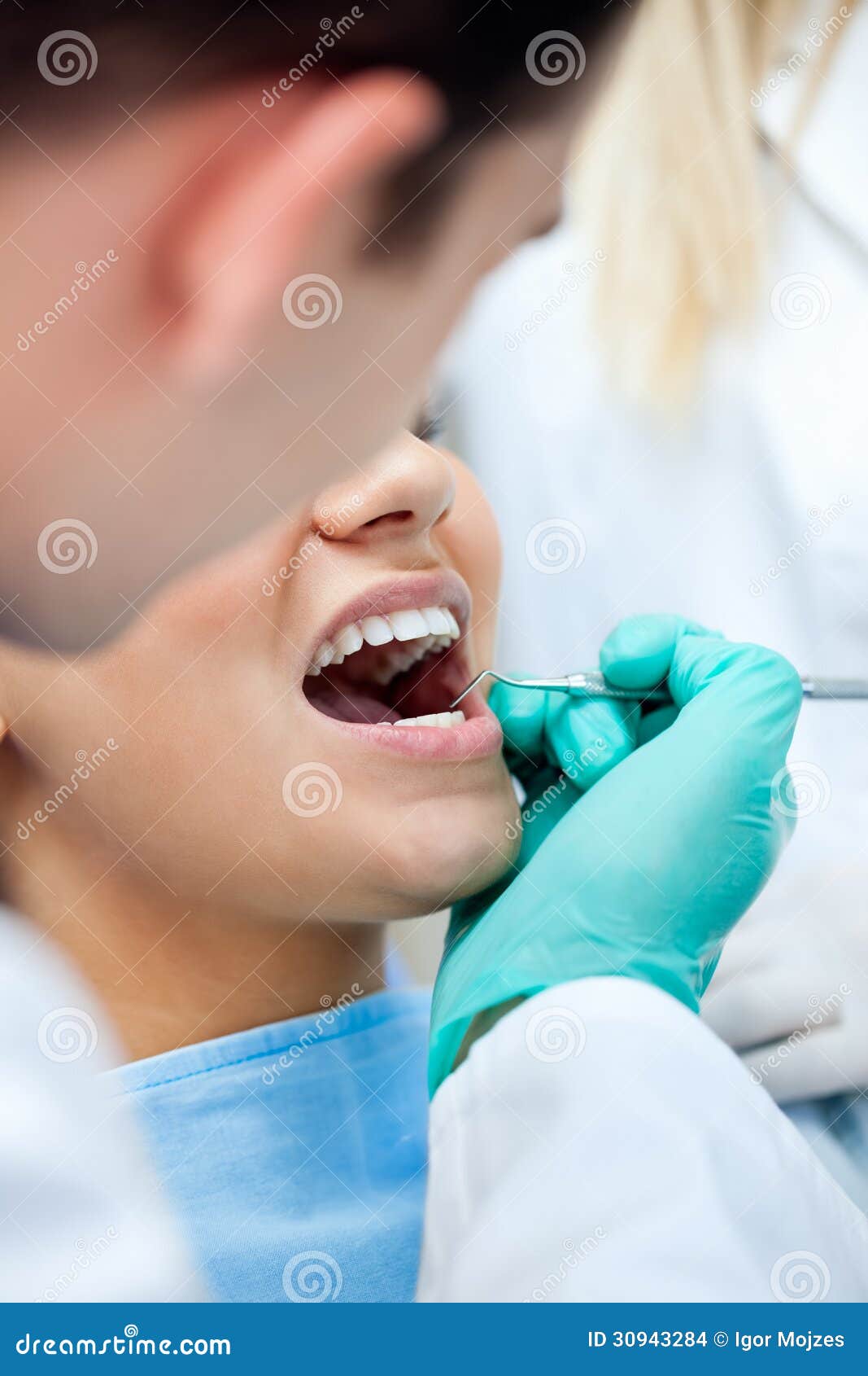 dental-care-dentist-checking-patient-s-teeth-concept-30943284.jpg