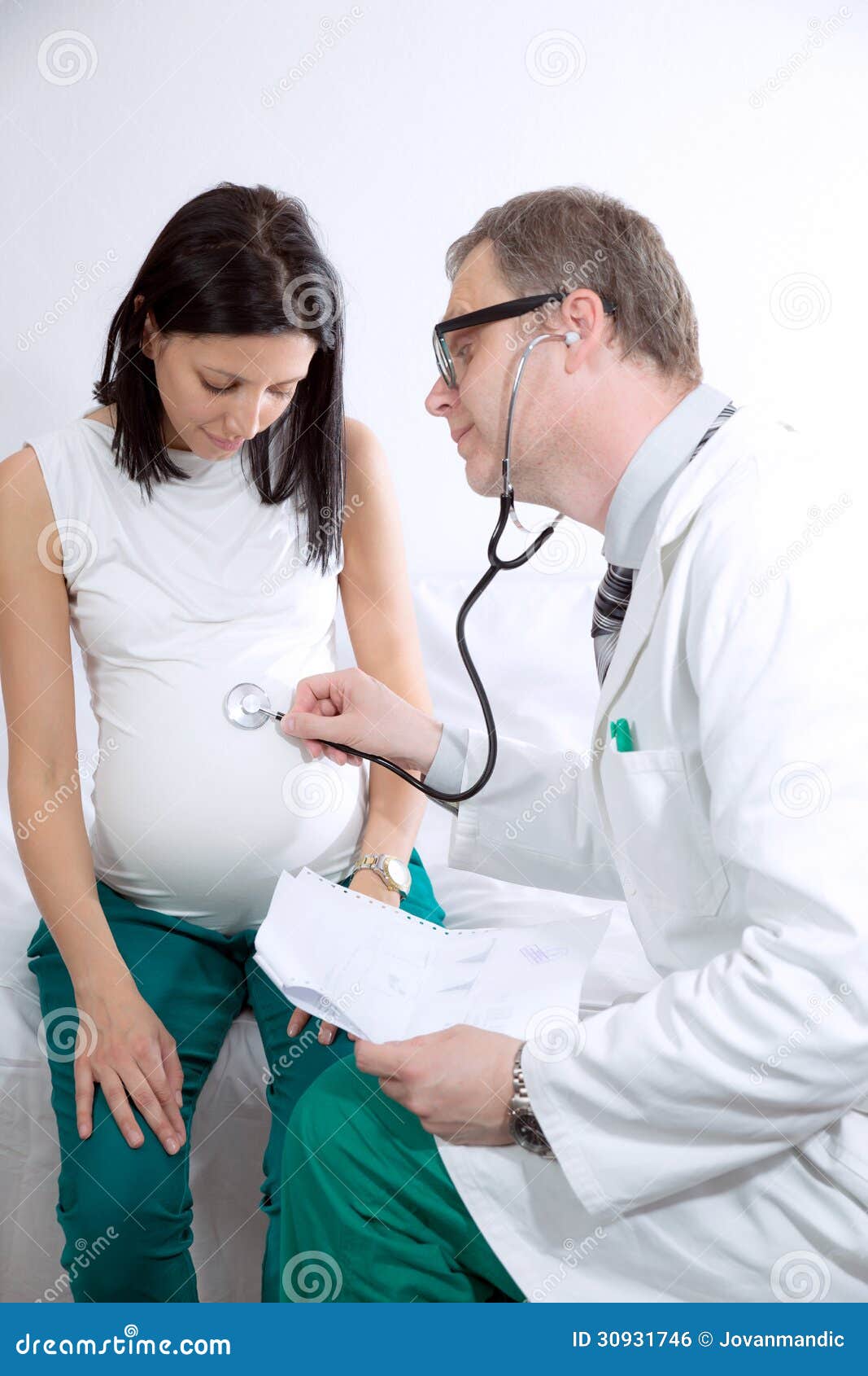 doctor-concentrating-pregnancy-examination-stethoscope-studio-shoot-30931746.jpg