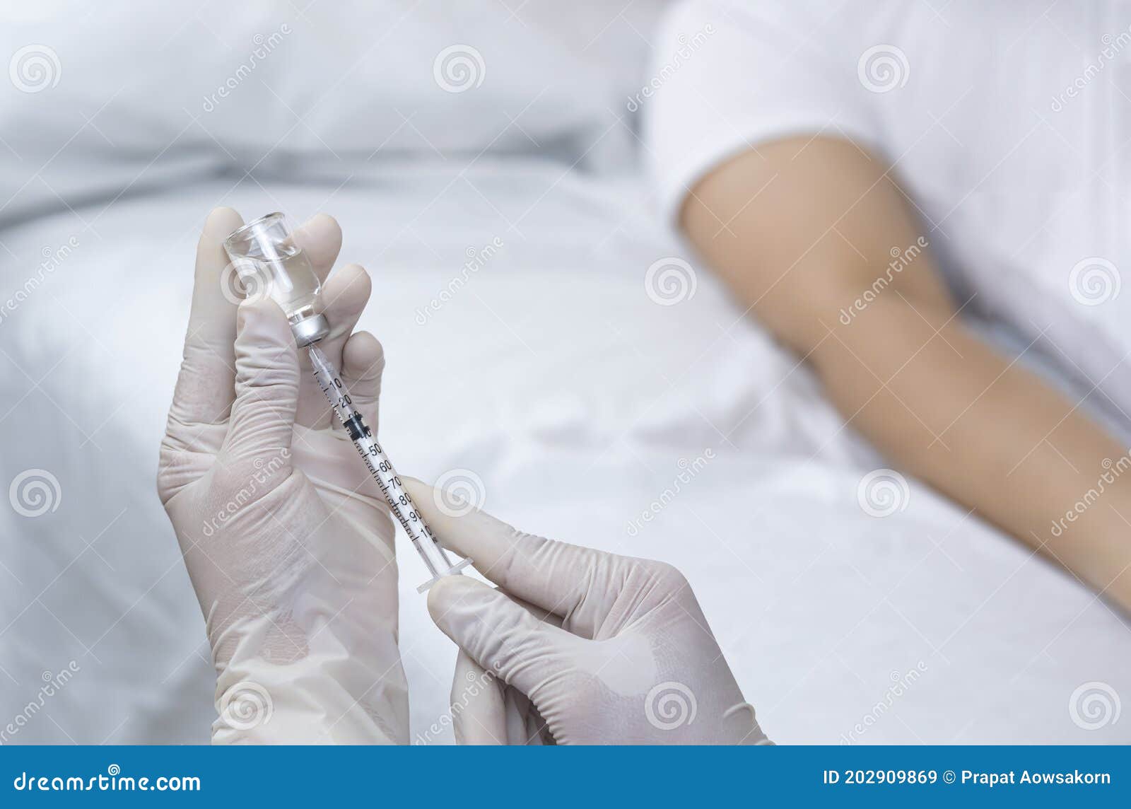 Doctor S Hand Holding Draw Syringe With Vial For Injection Into Patient