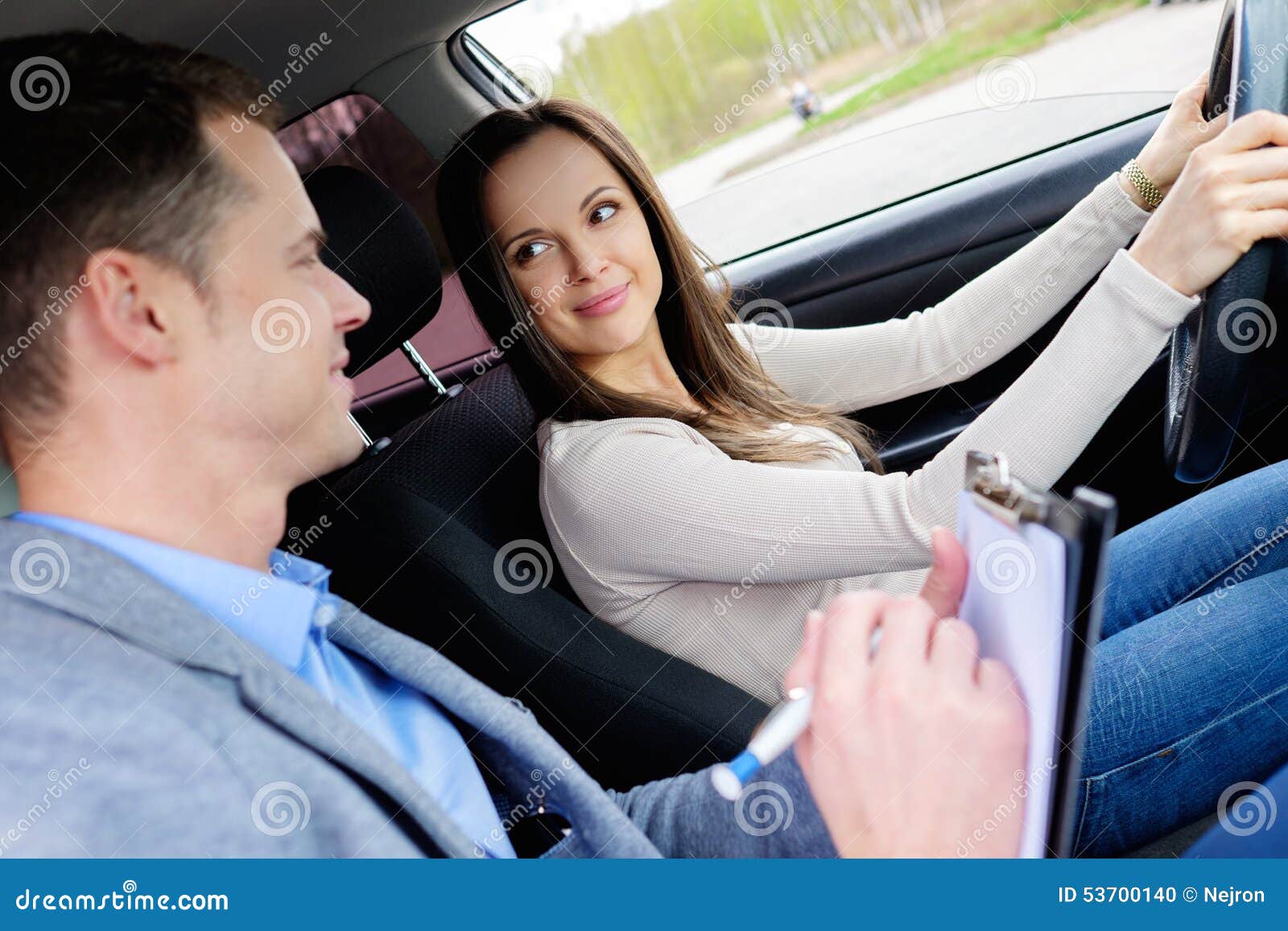 driving-instructor-woman-student-women-examination-car-53700140.jpg