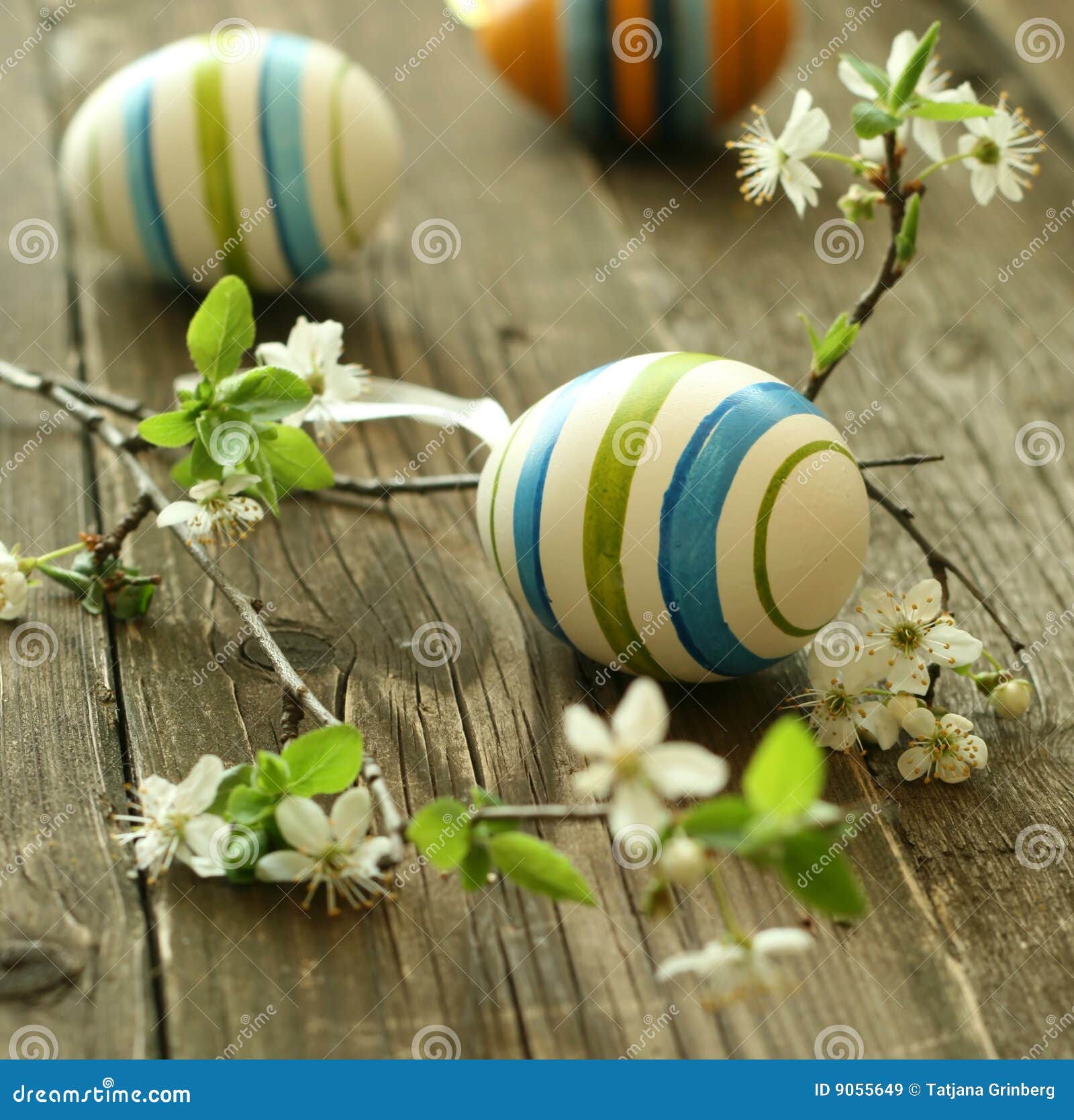  Free Stock Images: Easter eggs and branch with flowers on wooden