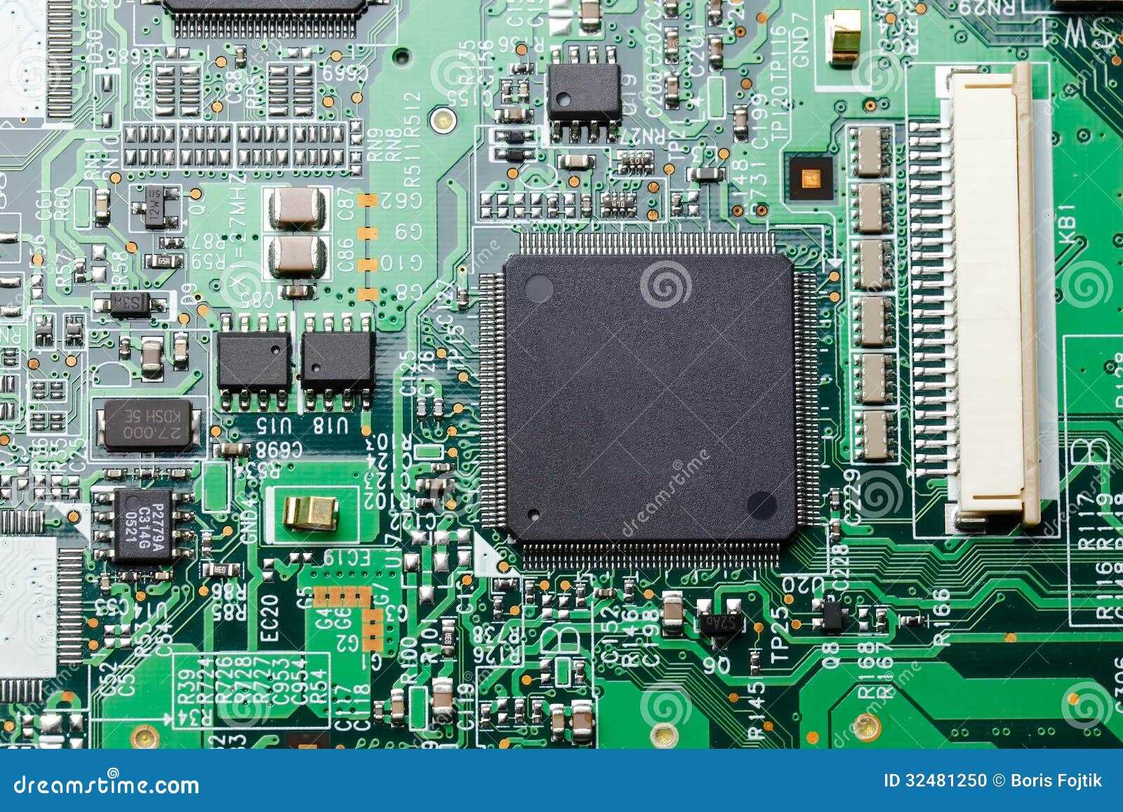 Electronic circuit board with components, focused to middle part.