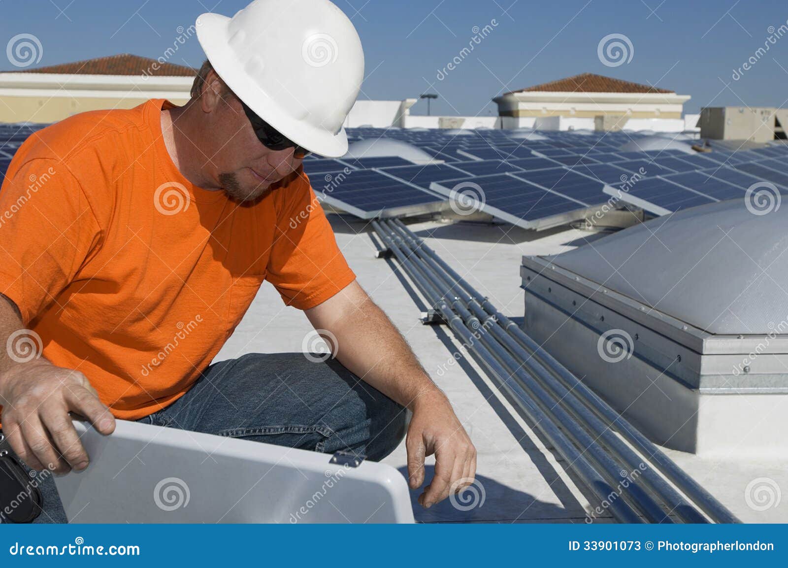 Engineer Working At Solar Power Plant Stock Photos - Image: 33901073