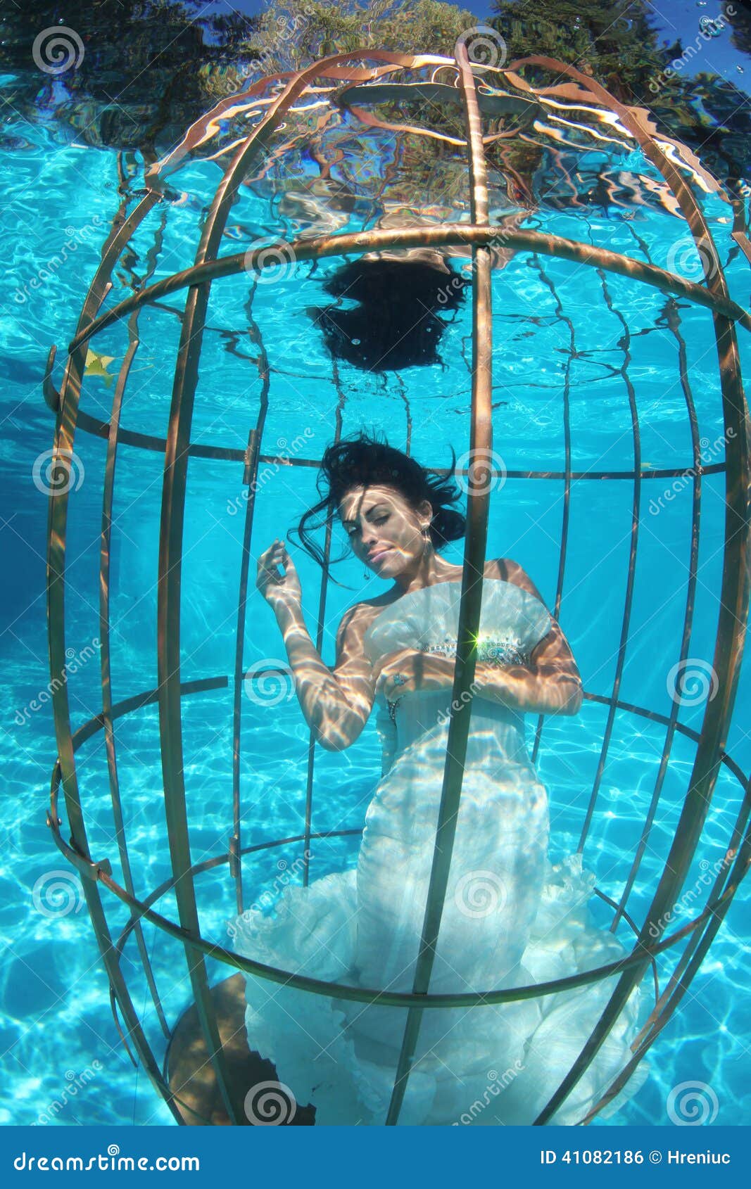 stock photo fantasy bride underwater bird cage diving lovely gorgeous wedding white dress sunny imag stock photo fantasy bride underwater bird cage diving lovely gorgeous wedding white dress sunny imag