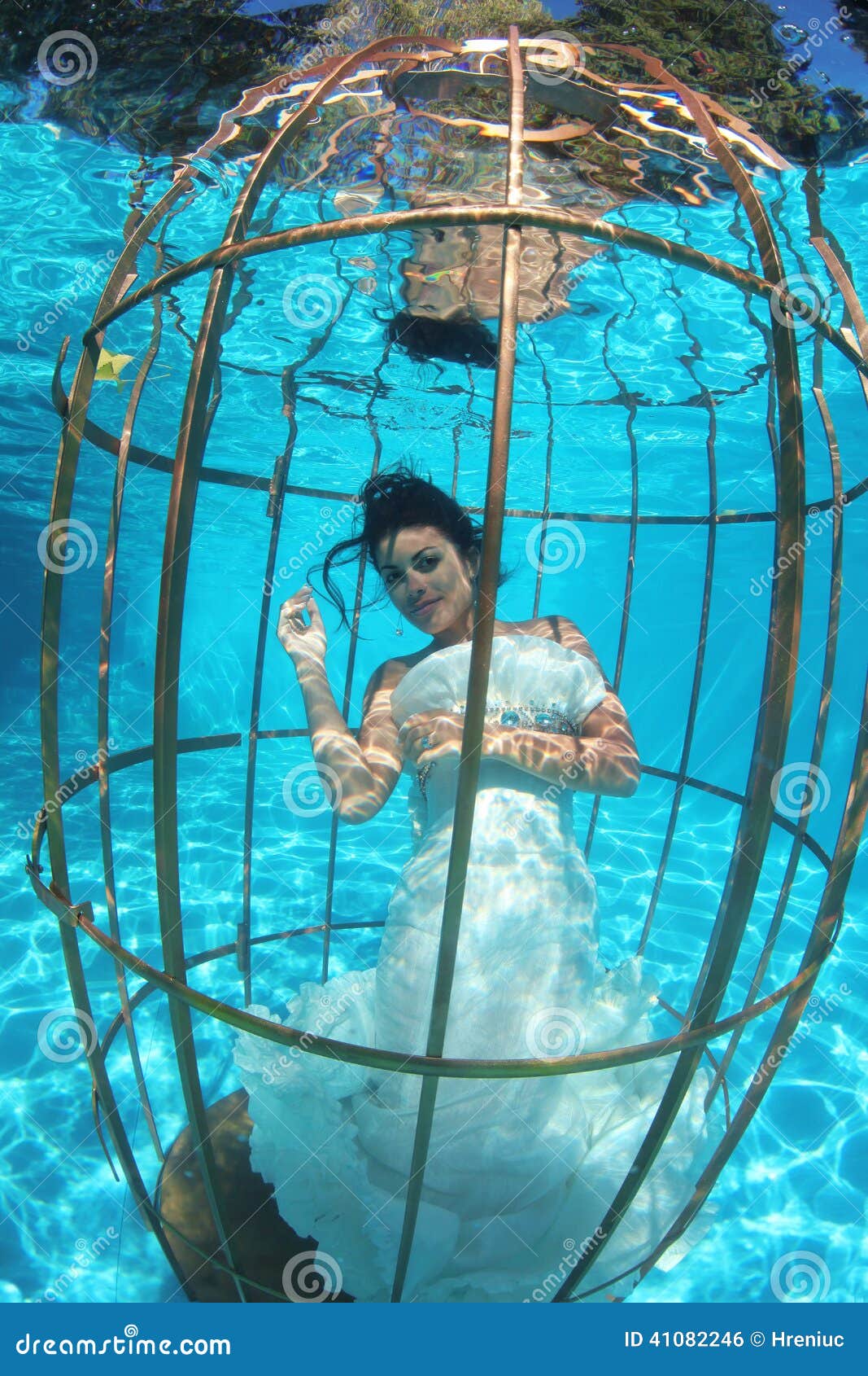 stock photo fantasy bride underwater bird cage diving lovely gorgeous wedding white dress sunny imag stock photo fantasy bride underwater bird cage diving lovely gorgeous wedding white dress sunny imag