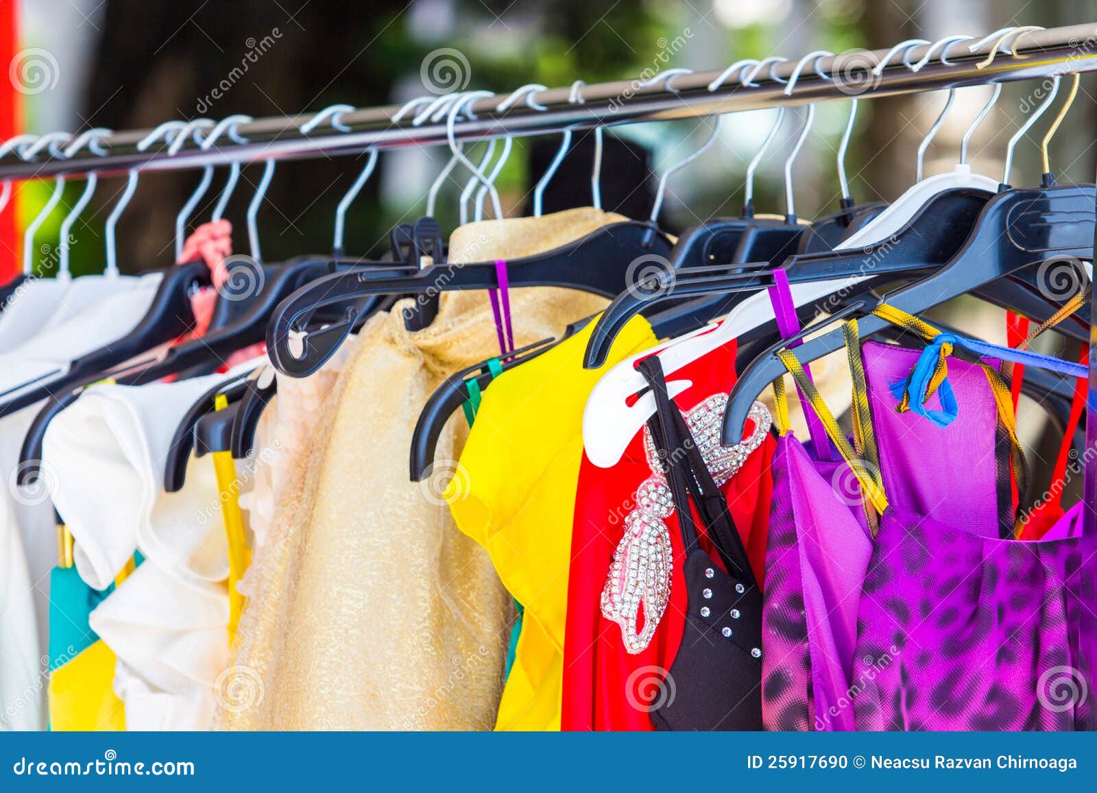 Fashion clothing on hangers at the show