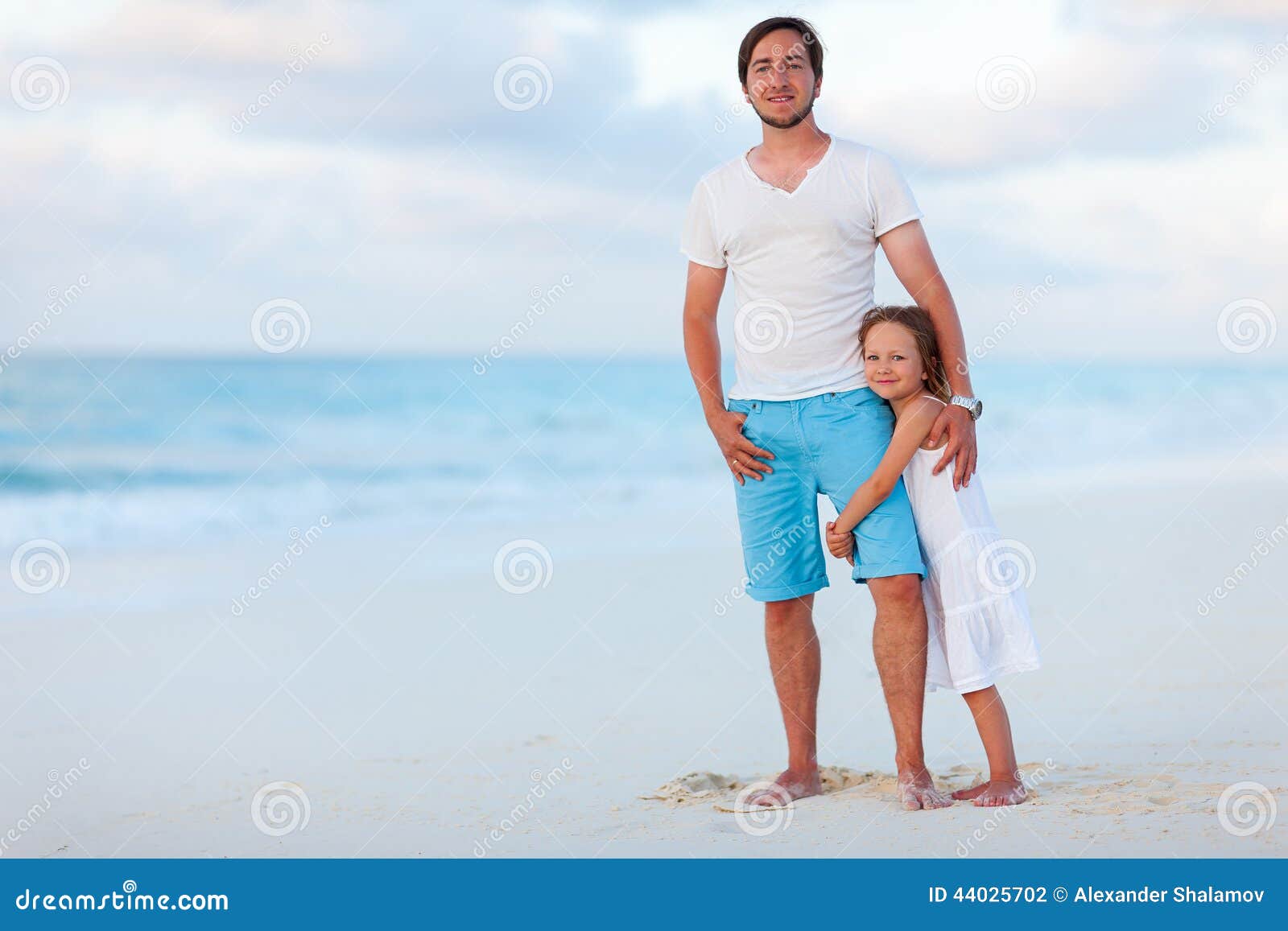 The Daughter Hugging Father On Nature On Summer Day 