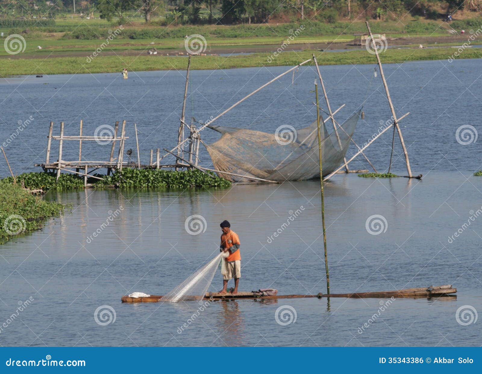 looking for fish in cengklik reservoir, solo, central java, indonesia