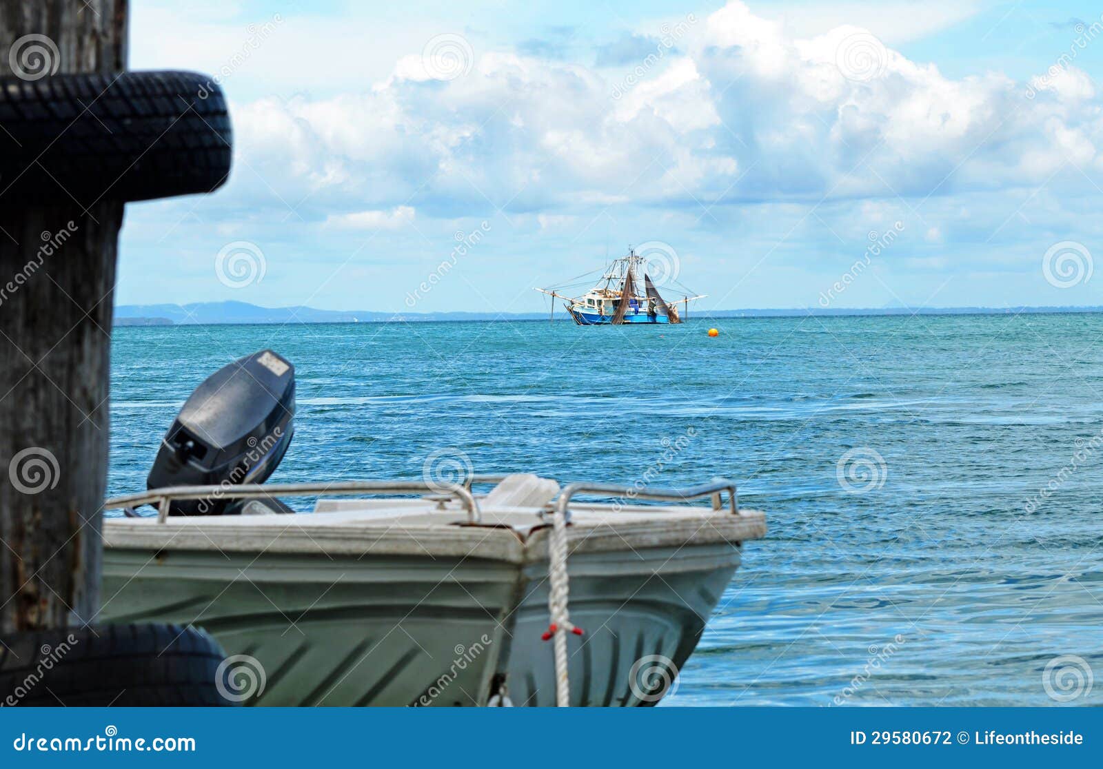 Fishing Trawler &amp; Motor Boat Dinghy At Sea Stock Photography - Image 