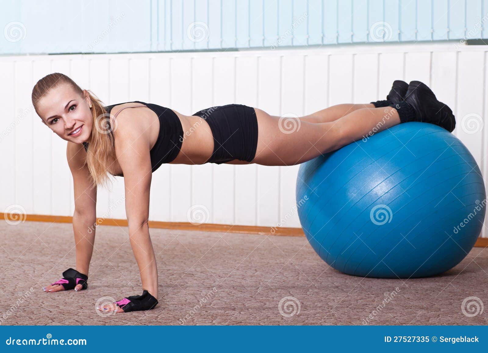fitness-woman-doing-push-up-ball-27527335.jpg