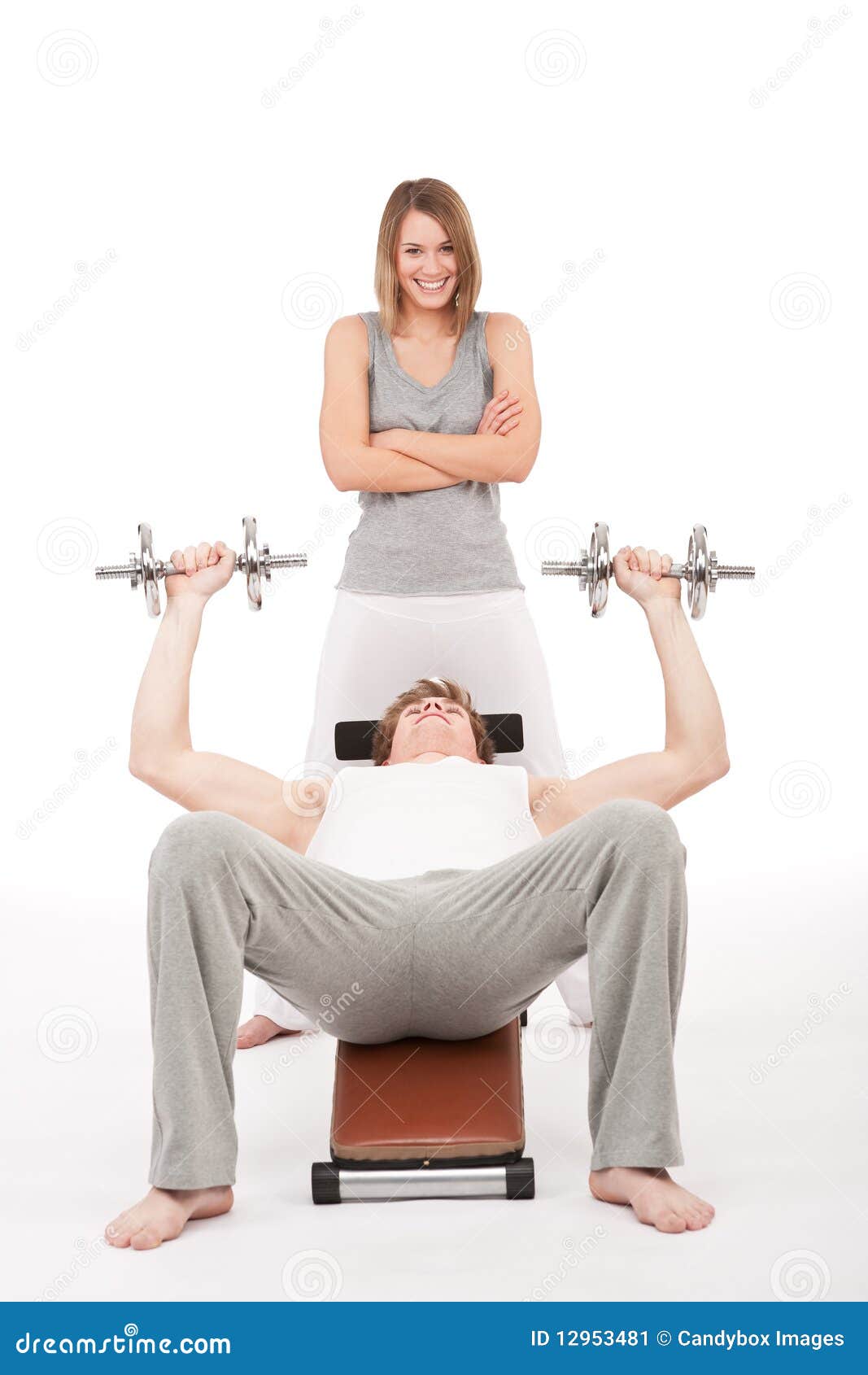  similar stock images of ` Fitness - young man on bench with weights