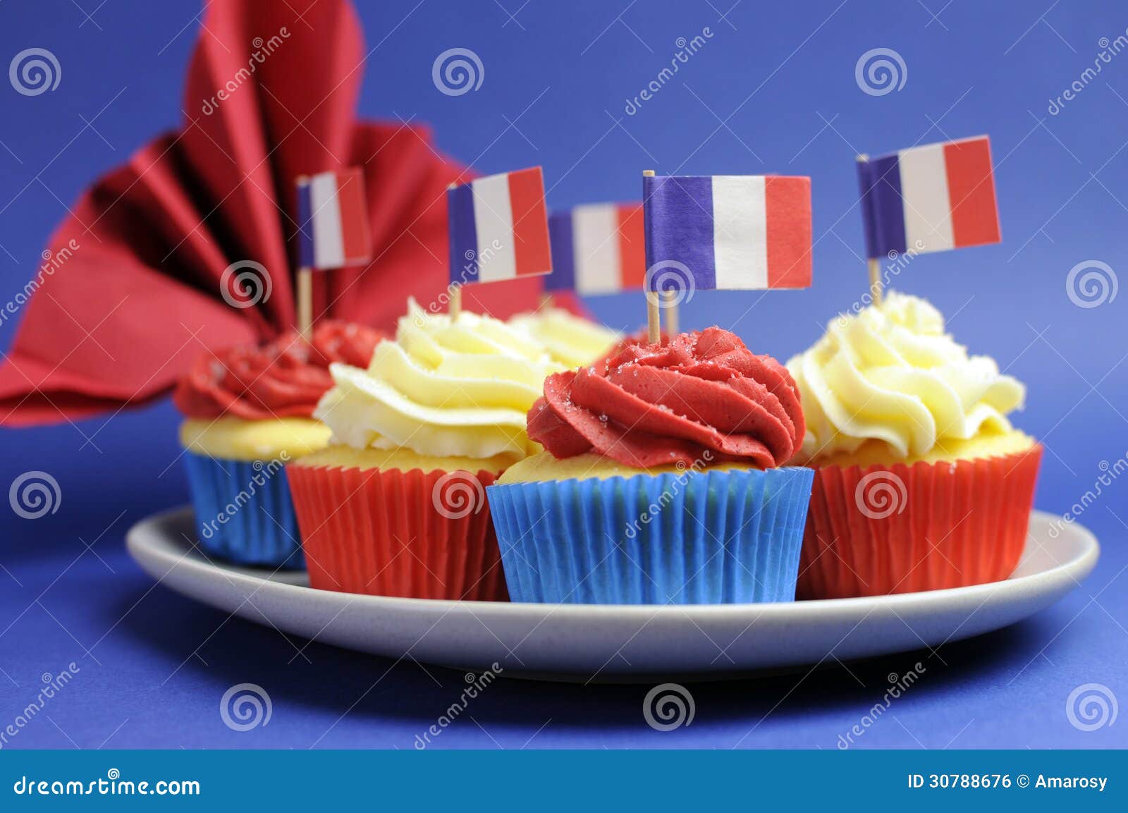 French Theme Red White And Blue Mini Cupcake Cakes With Flags Of french-theme-red-white-and-blue-mini-cupcake-cakes-with-flags-of