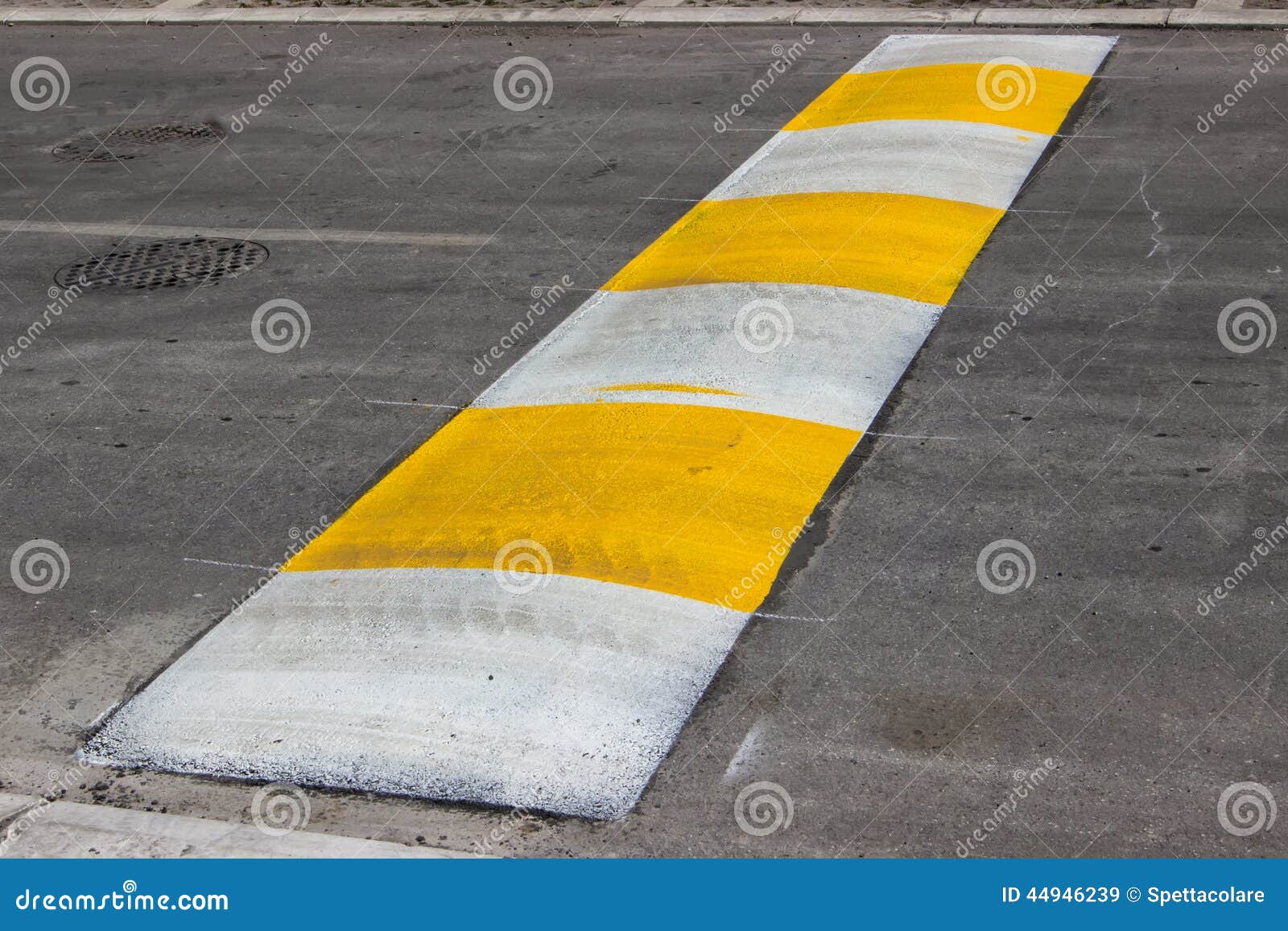 Freshly Painted Speed Bump For Slowing Traffic Near School Stock Photo - Image: 44946239