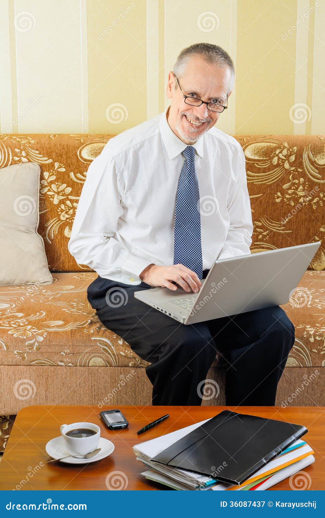 Senior Businessman With Computer Friendly Senior Businessman With Computer Royalty Free