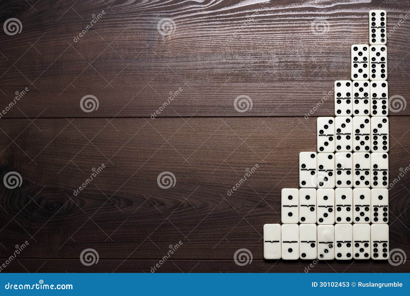 Stock Photos: Full set of domino pieces on wooden table