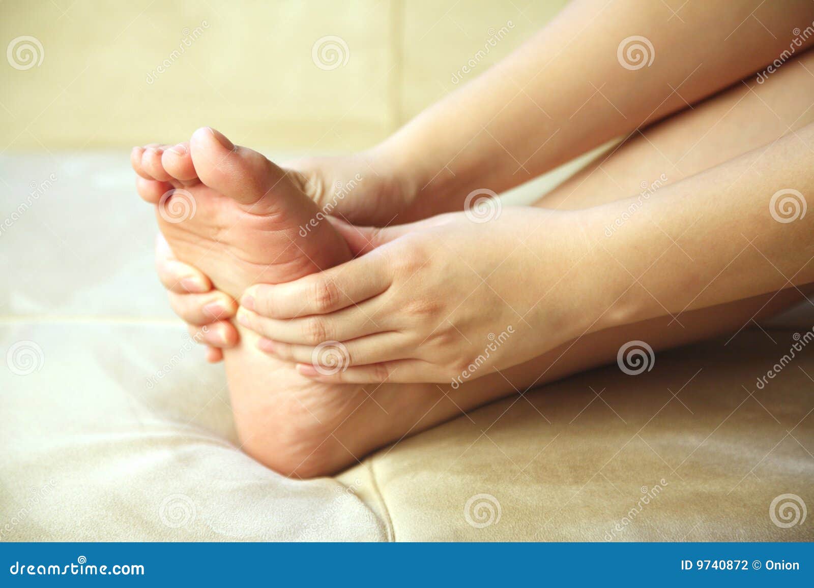 Girl Giving Herself A Foot Massage Stock Photography Image 9740872