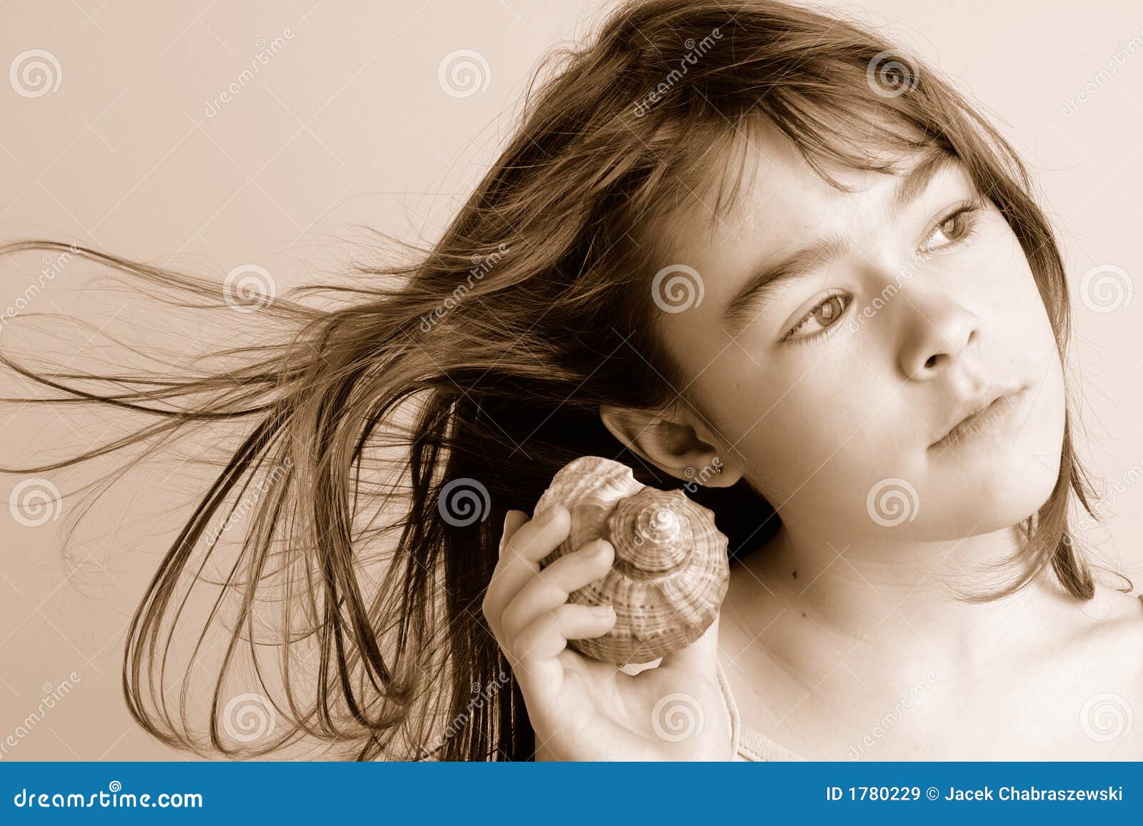 Girl Listening to <b>Sea Shell</b> Royalty Free Stock Images - girl-listening-to-sea-shell-1780229